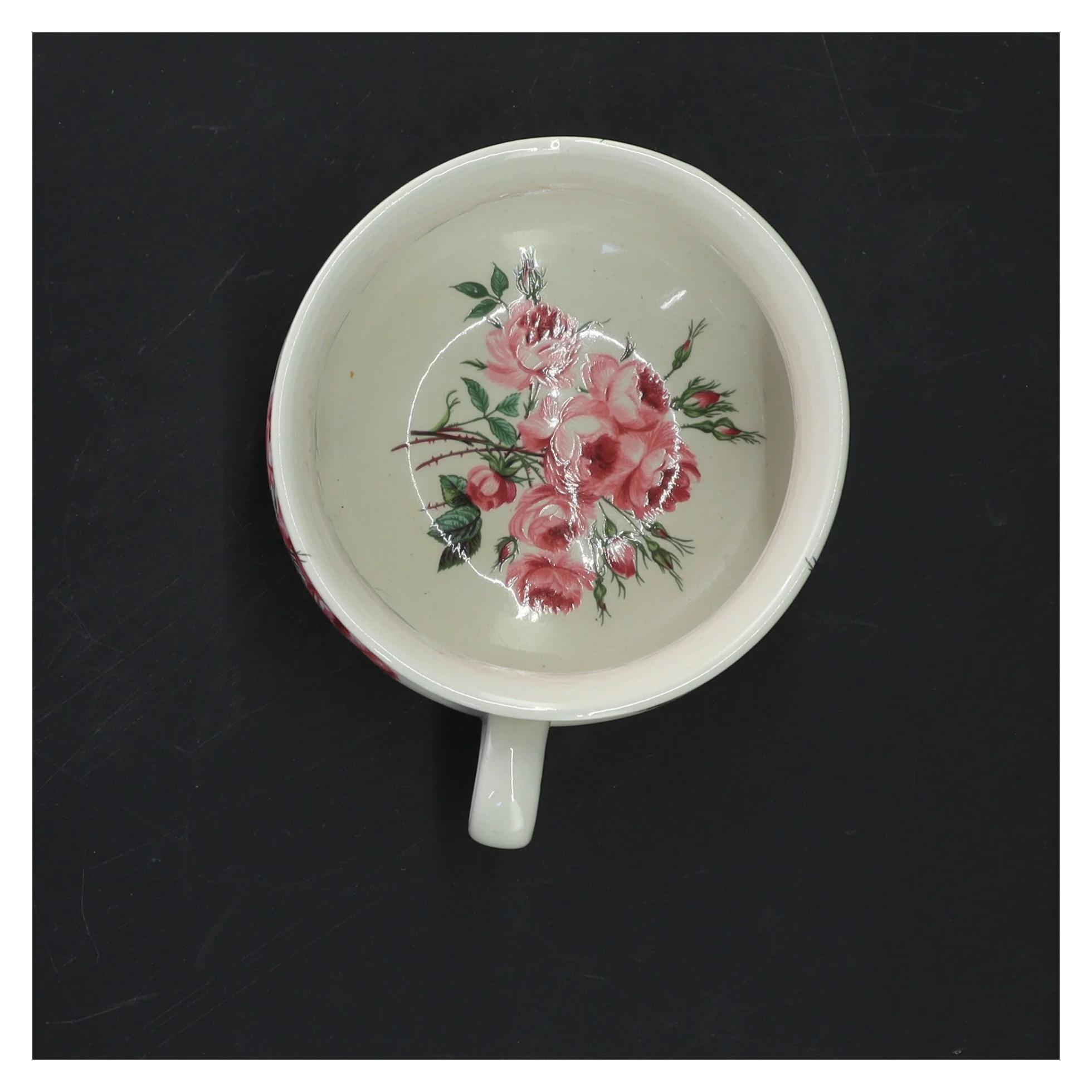 Porcelænskop med rosemotiv fra Portmeirion Pottery (str. Ø 11 cm)