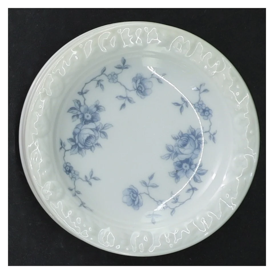 Porcelænstallerkener med blåt blomstermotiv fra Rosenthal (str. Ø. 9 cm)