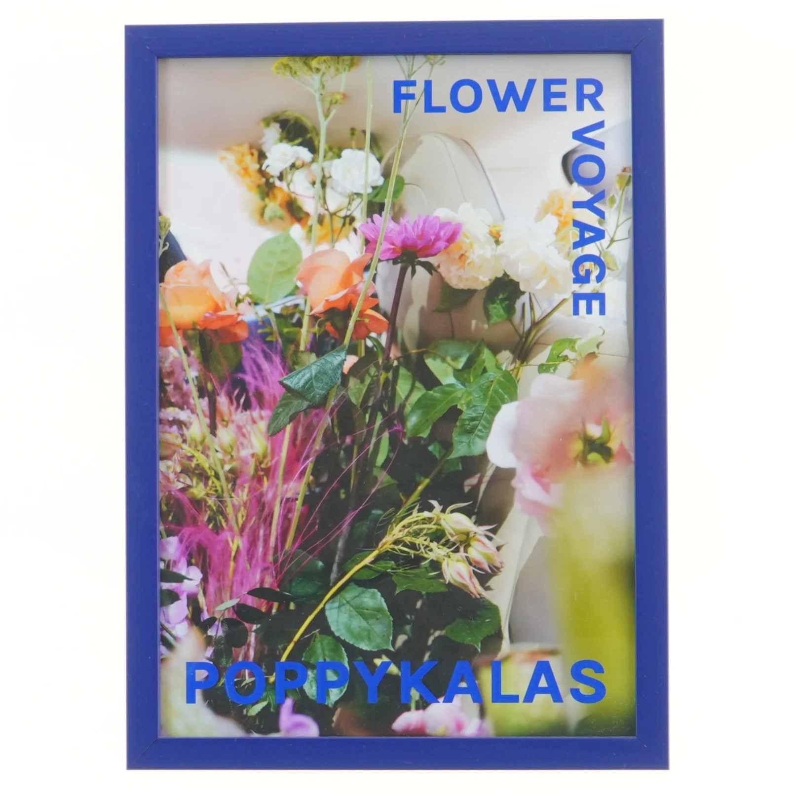 Blomsterbillede med blå ramme (str. 32x23 cm)