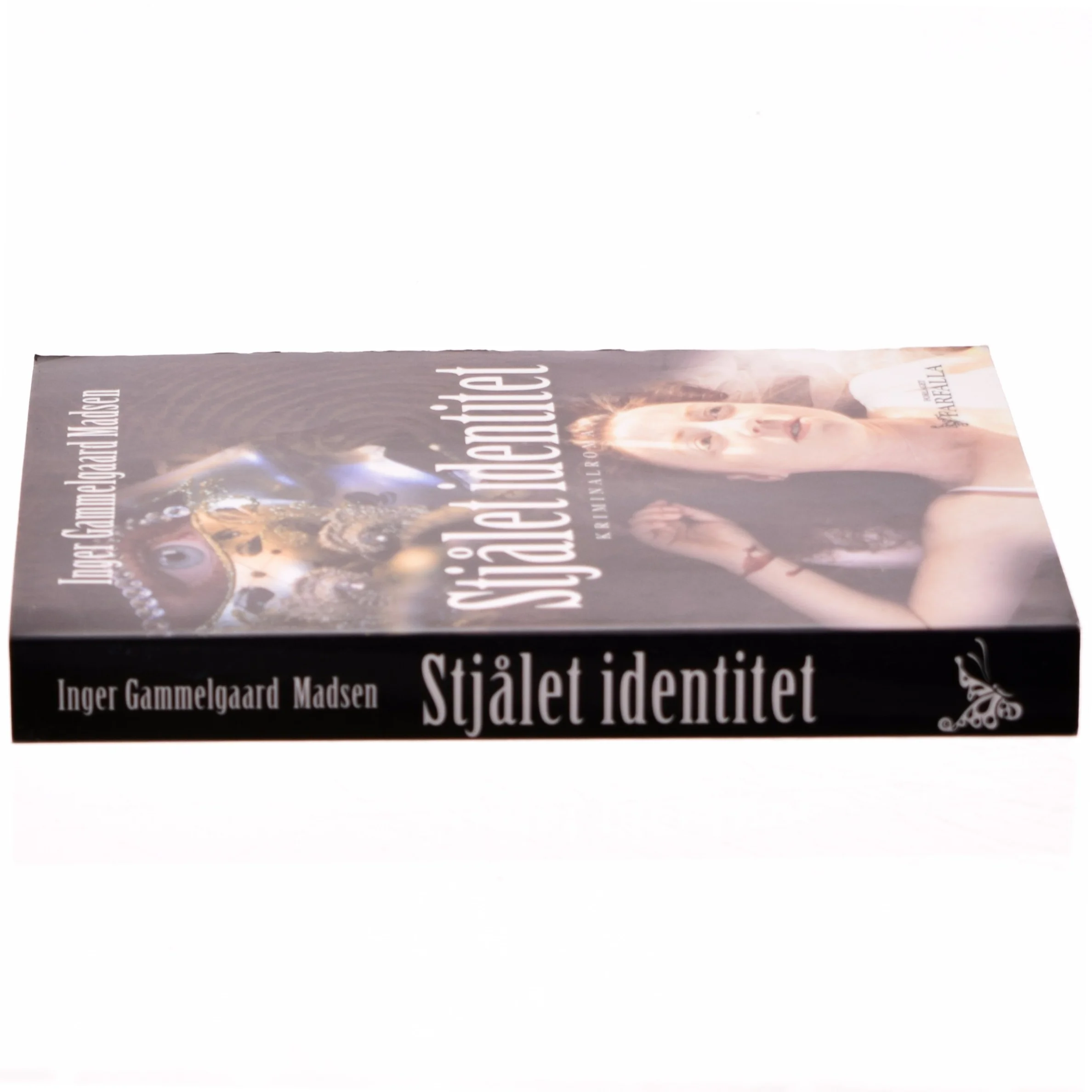 Stjålet identitet : kriminalroman af Inger Gammelgaard Madsen (Bog)