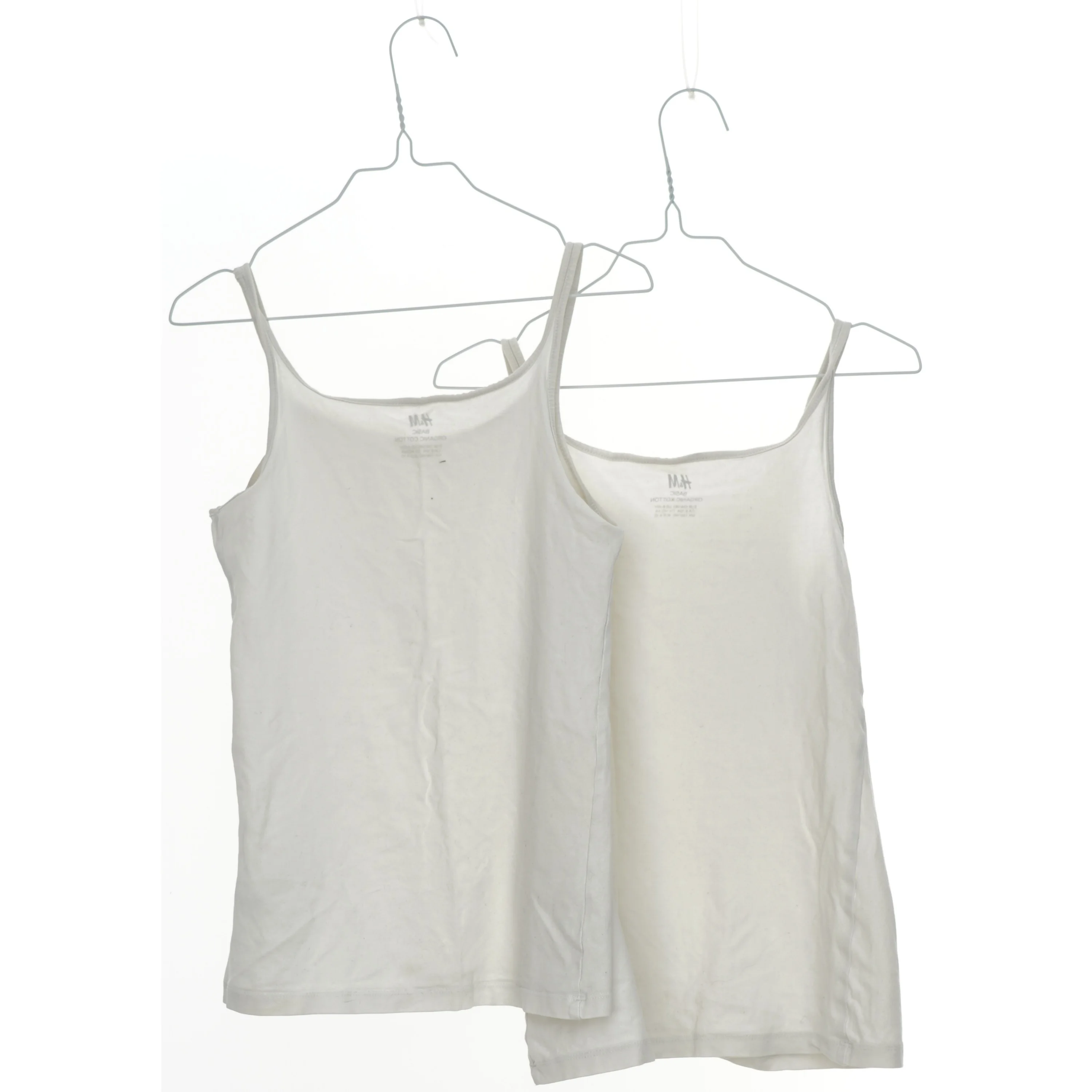Hvide toppe fra H&M (str. 134)