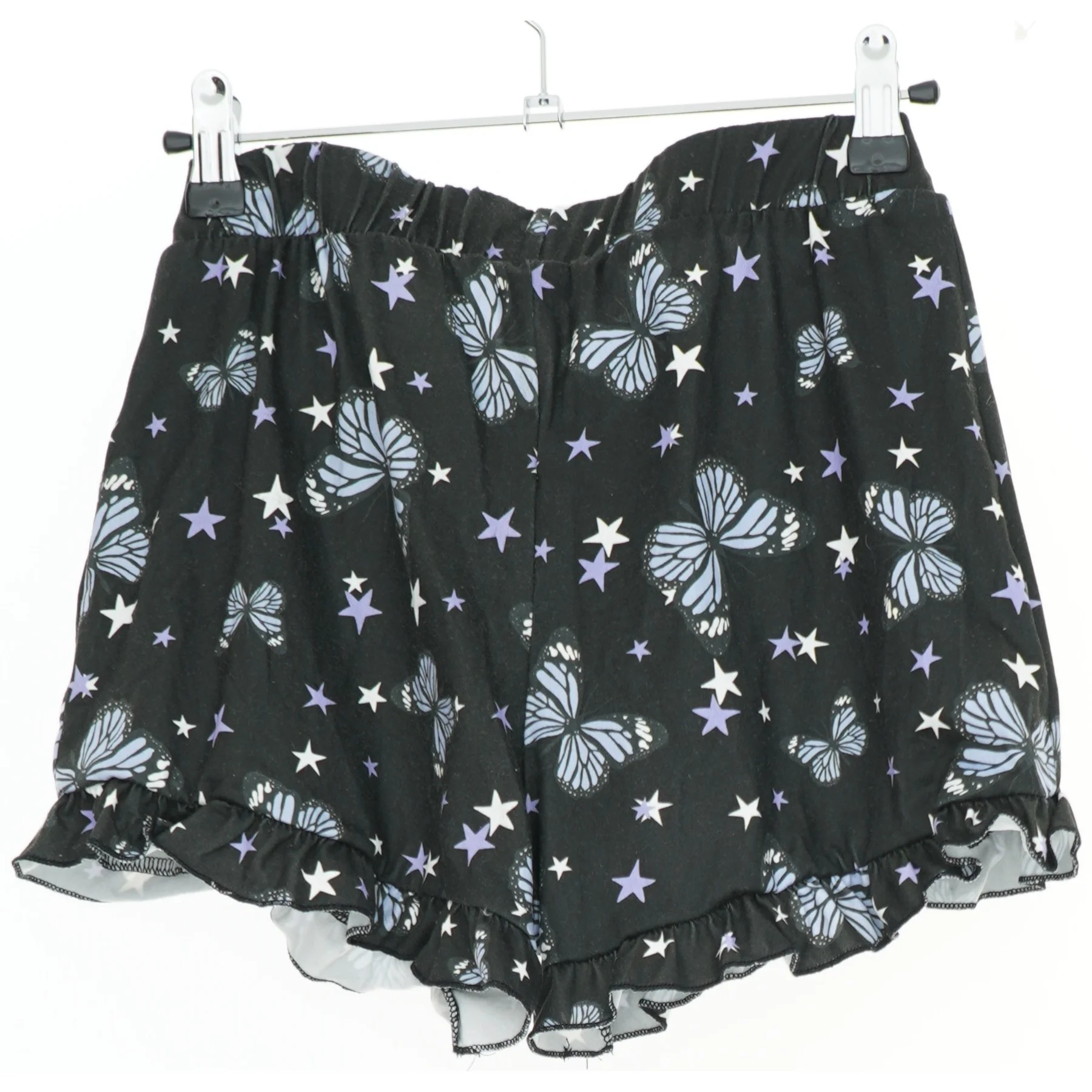 Shorts med butterfly og stjerner fra New Look (str. S)
