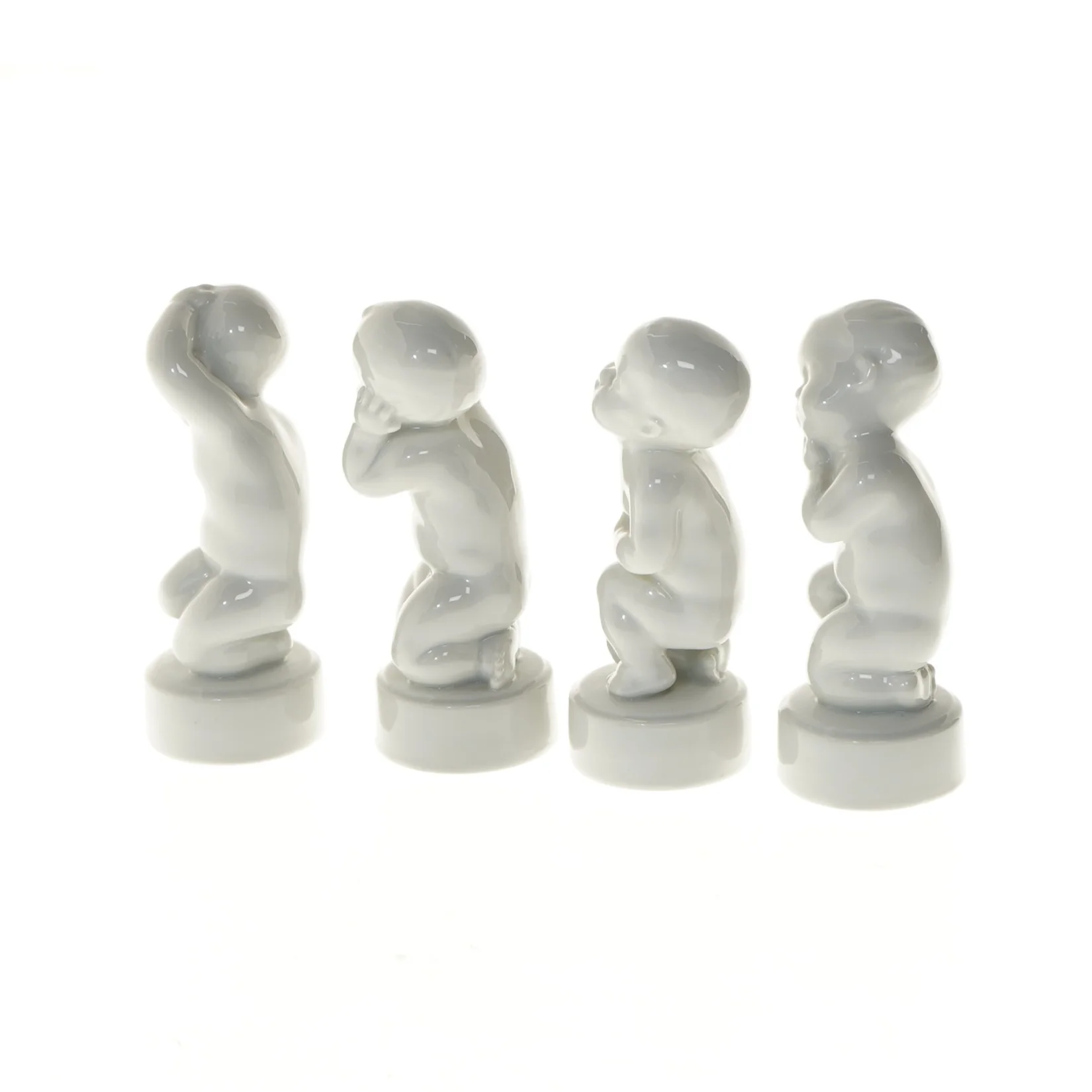 Porcelænsfigurer af de fire piner (str. 11,5 cm) fra B&G