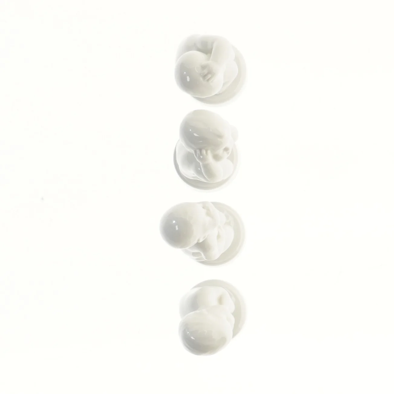 Porcelænsfigurer af de fire piner (str. 11,5 cm) fra B&G