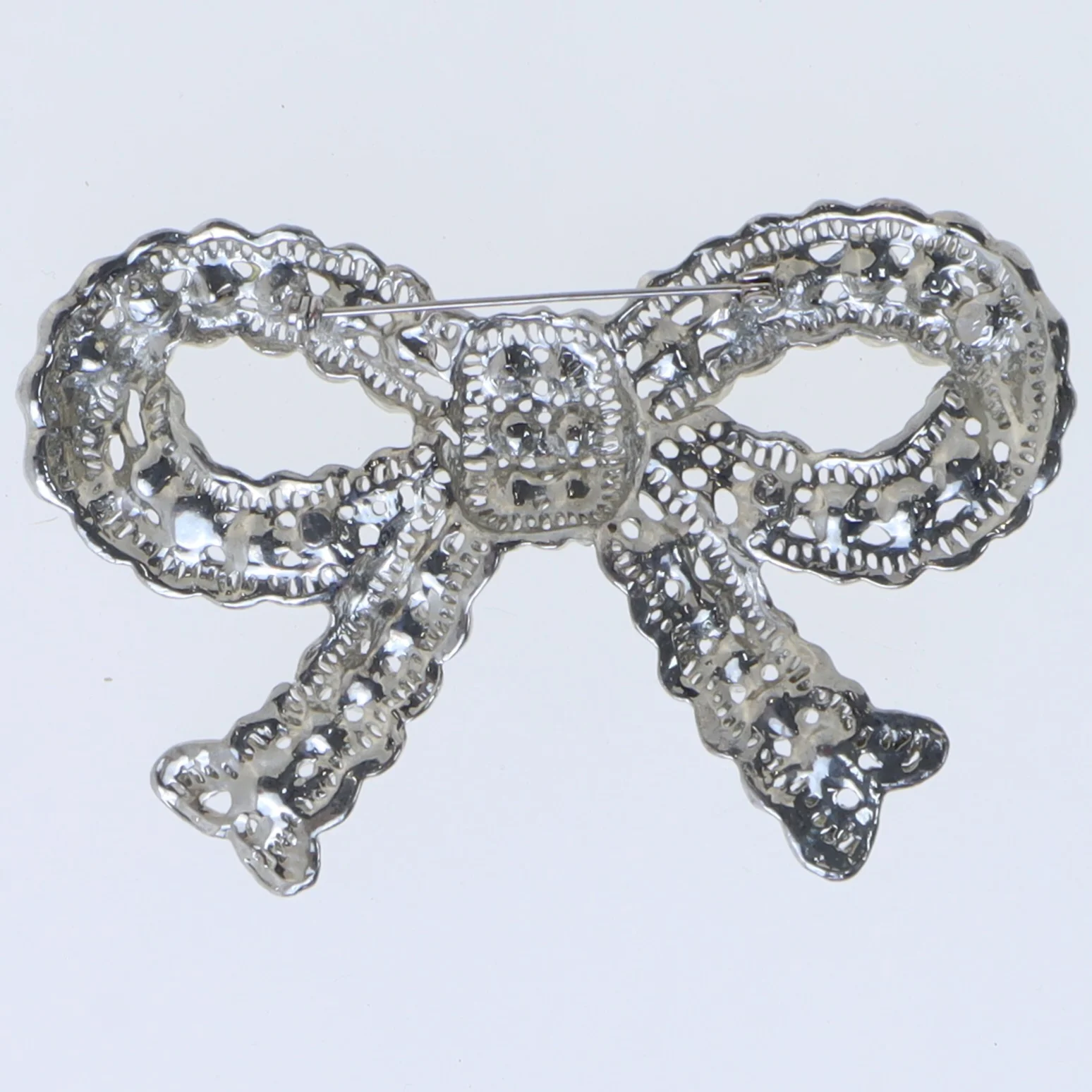 Broche i form af en sløjfe (str. 9 cm)