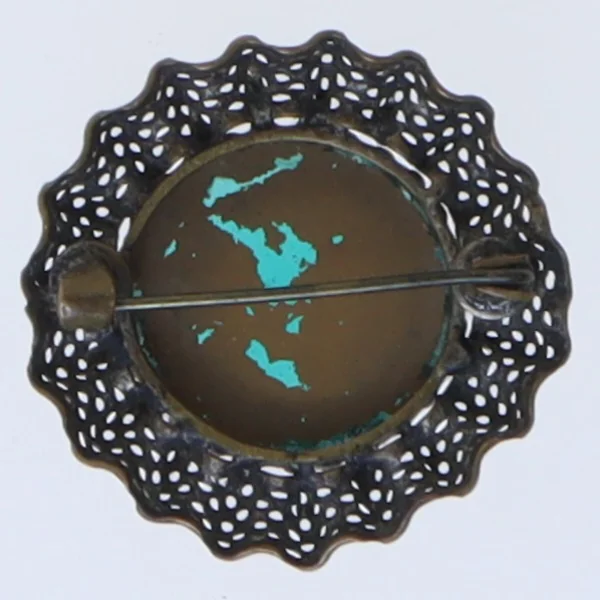Vintage broche med grøn sten (str. 3 cm)