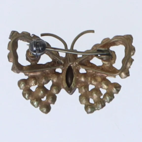 Sommerfugleformet broche med blå og klare sten (str. 3,5 cm)