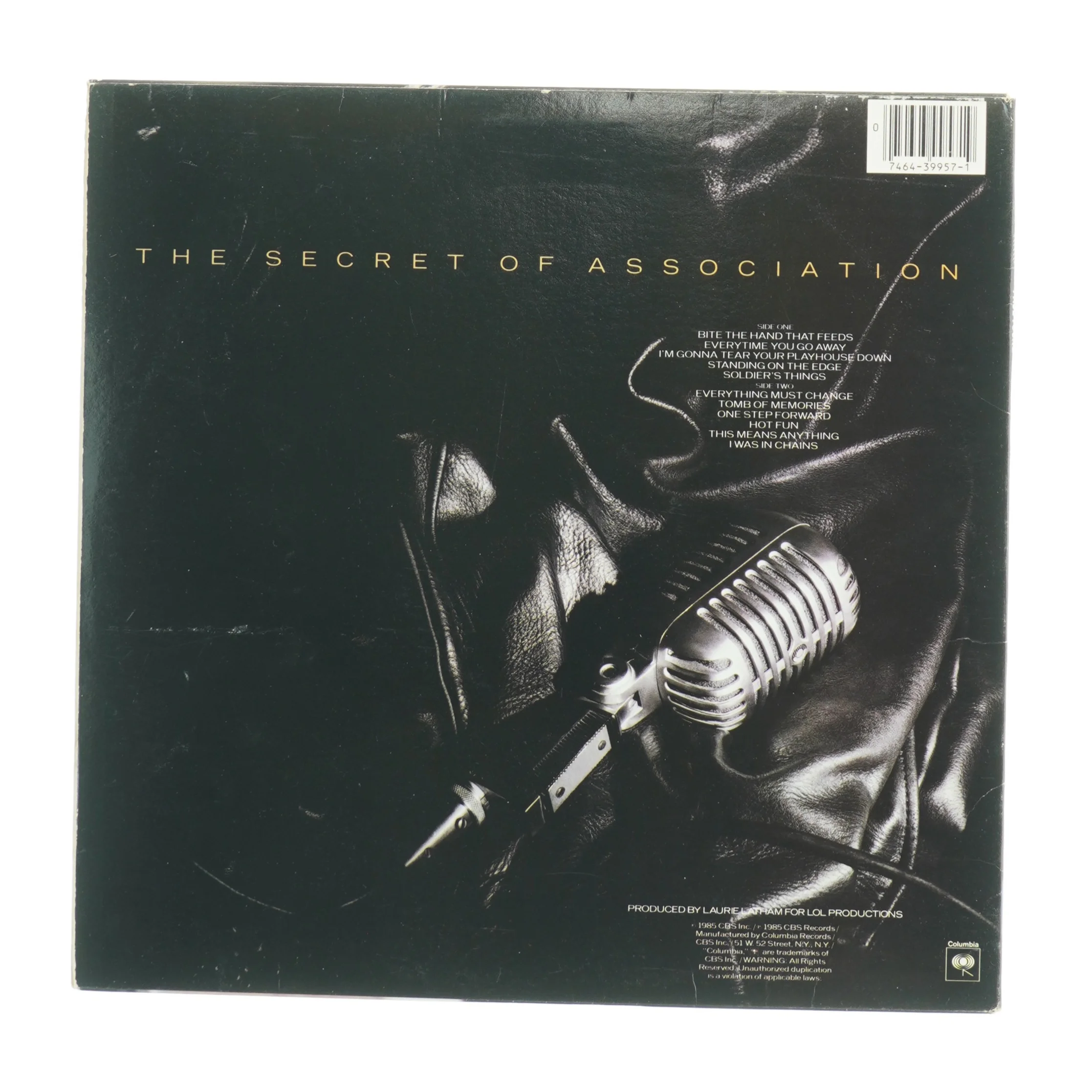 Paul Young - The Secret of Association LP fra Columbia (str. 31 x 31 cm)