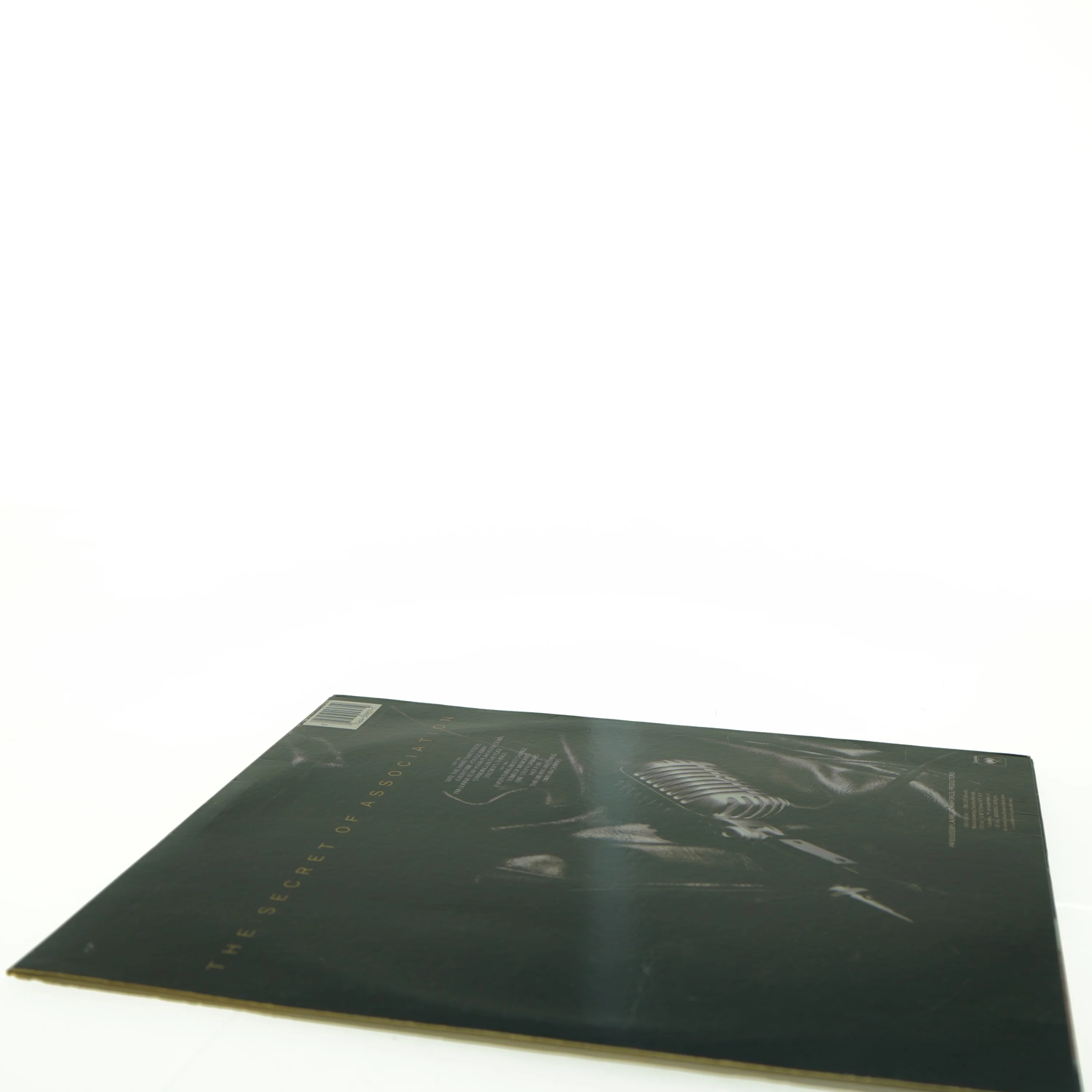 Paul Young - The Secret of Association LP fra Columbia (str. 31 x 31 cm)