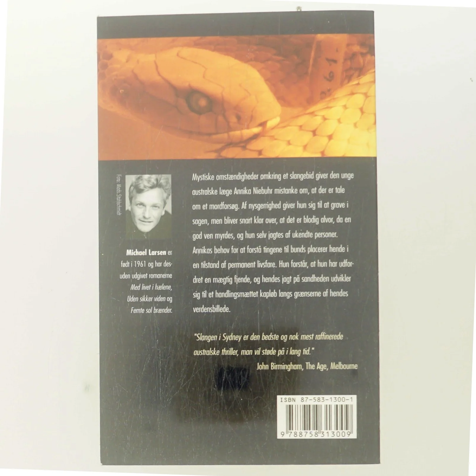 Slangen i Sydney : roman af Michael Larsen (f. 1961) (Bog)