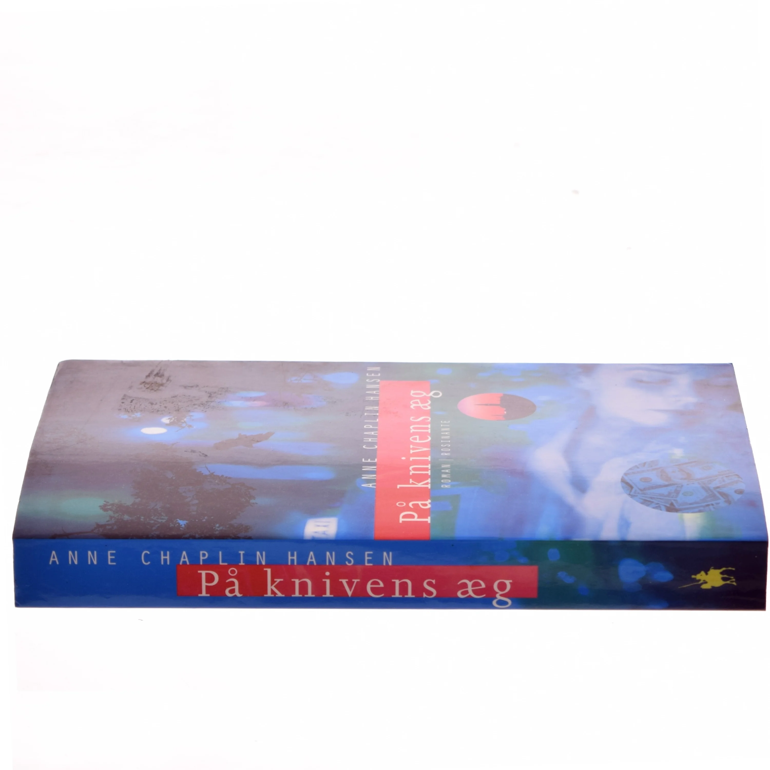 På knivens æg : roman af Anne Chaplin Hansen (Bog)