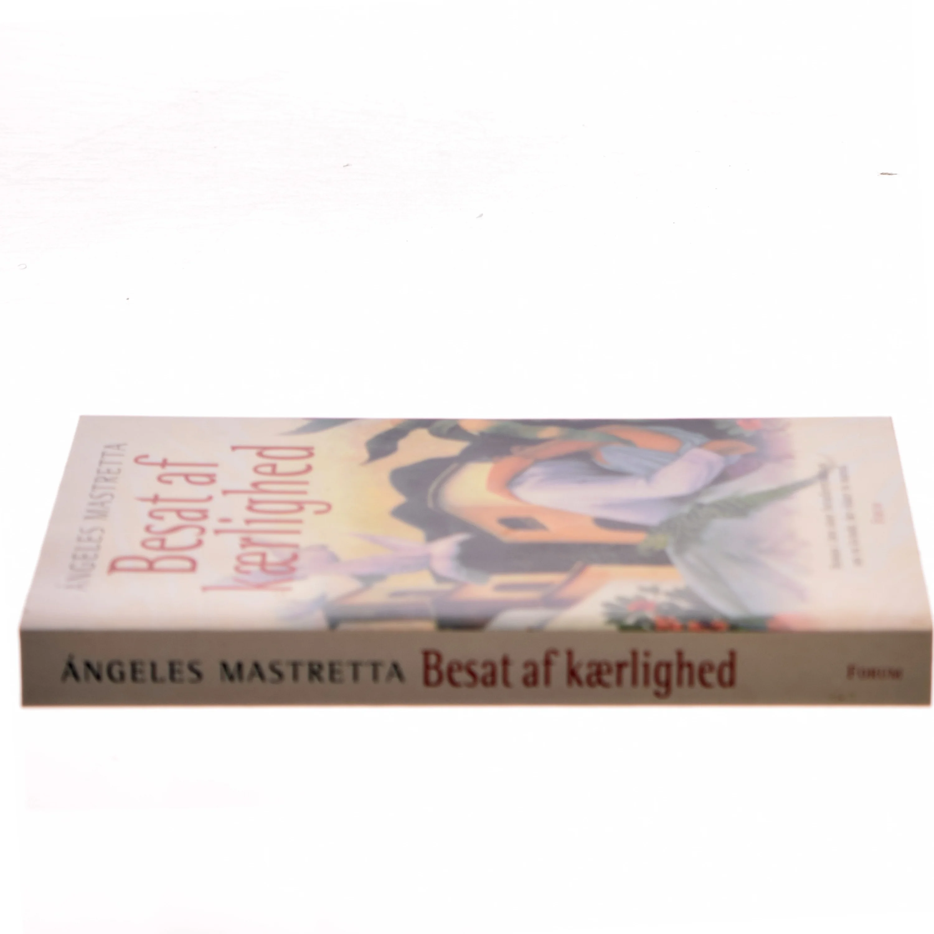 Besat af kærlighed : roman af Angeles Mastretta (Bog)
