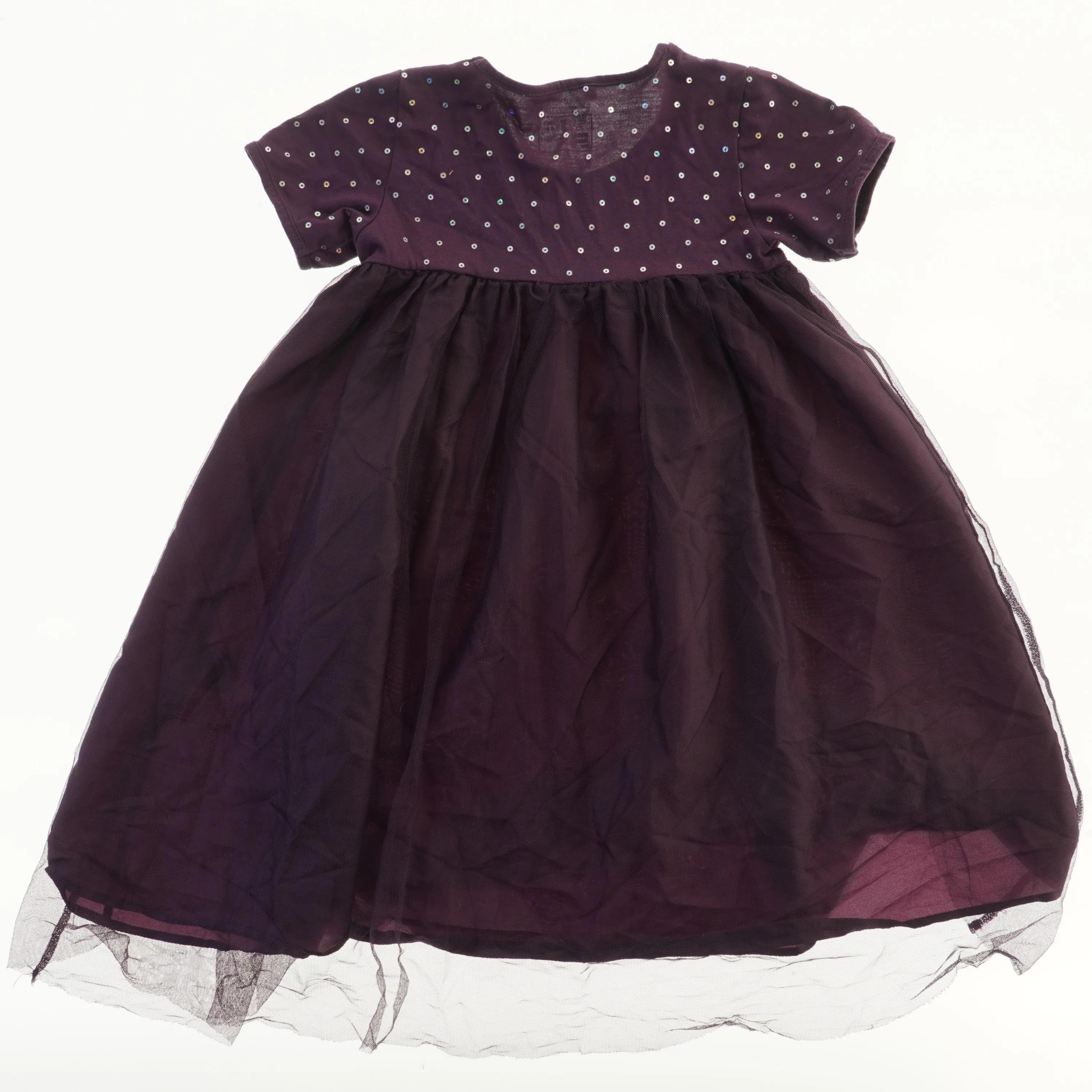 Kjole med glitrende detaljer fra Mads & Mette (str. 122)