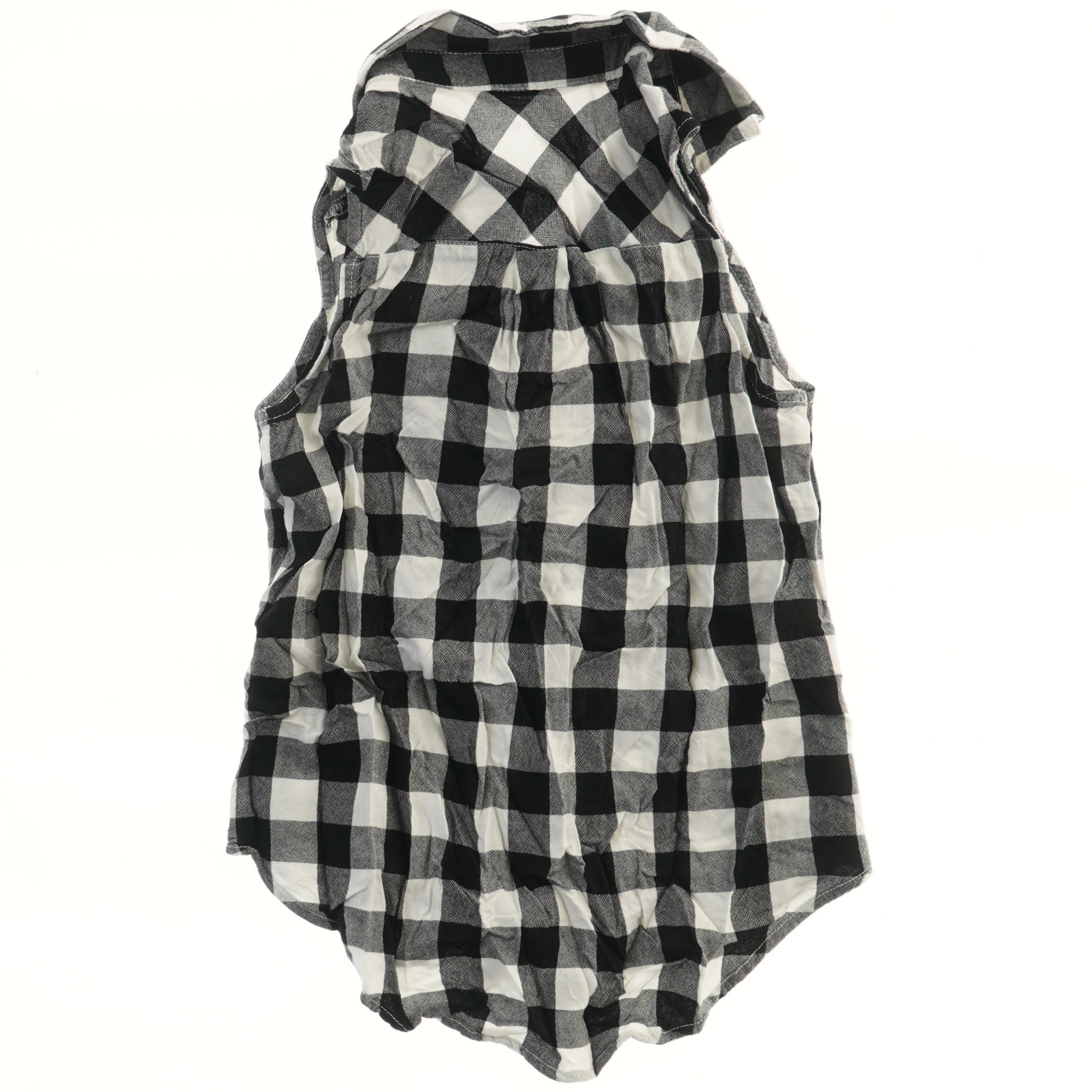 Ærmeløs skjorte i sort-hvid tern fra H&M (str. 140)