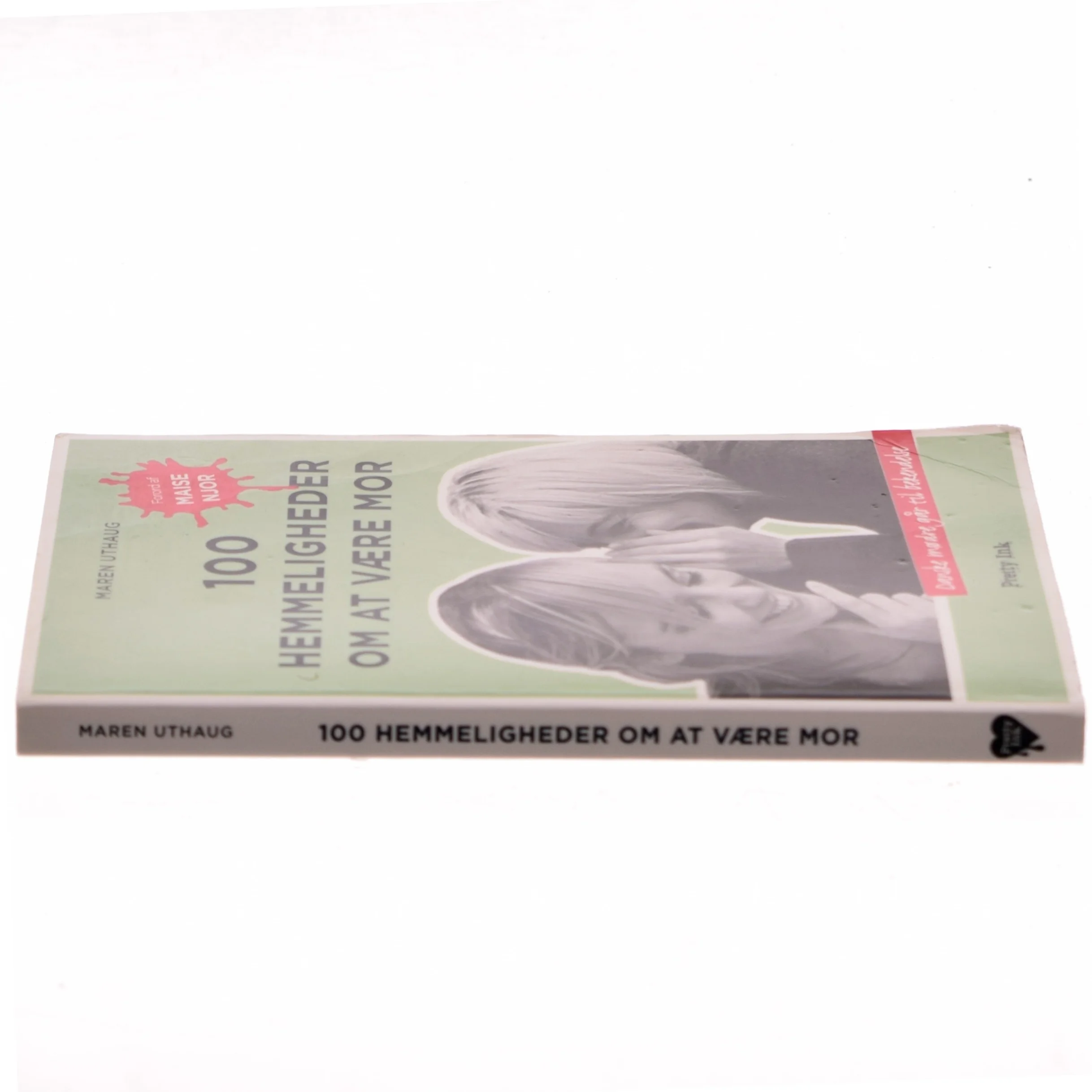 100 hemmeligheder om at være mor : danske mødre går til bekendelse af Maren Uthaug (Bog)