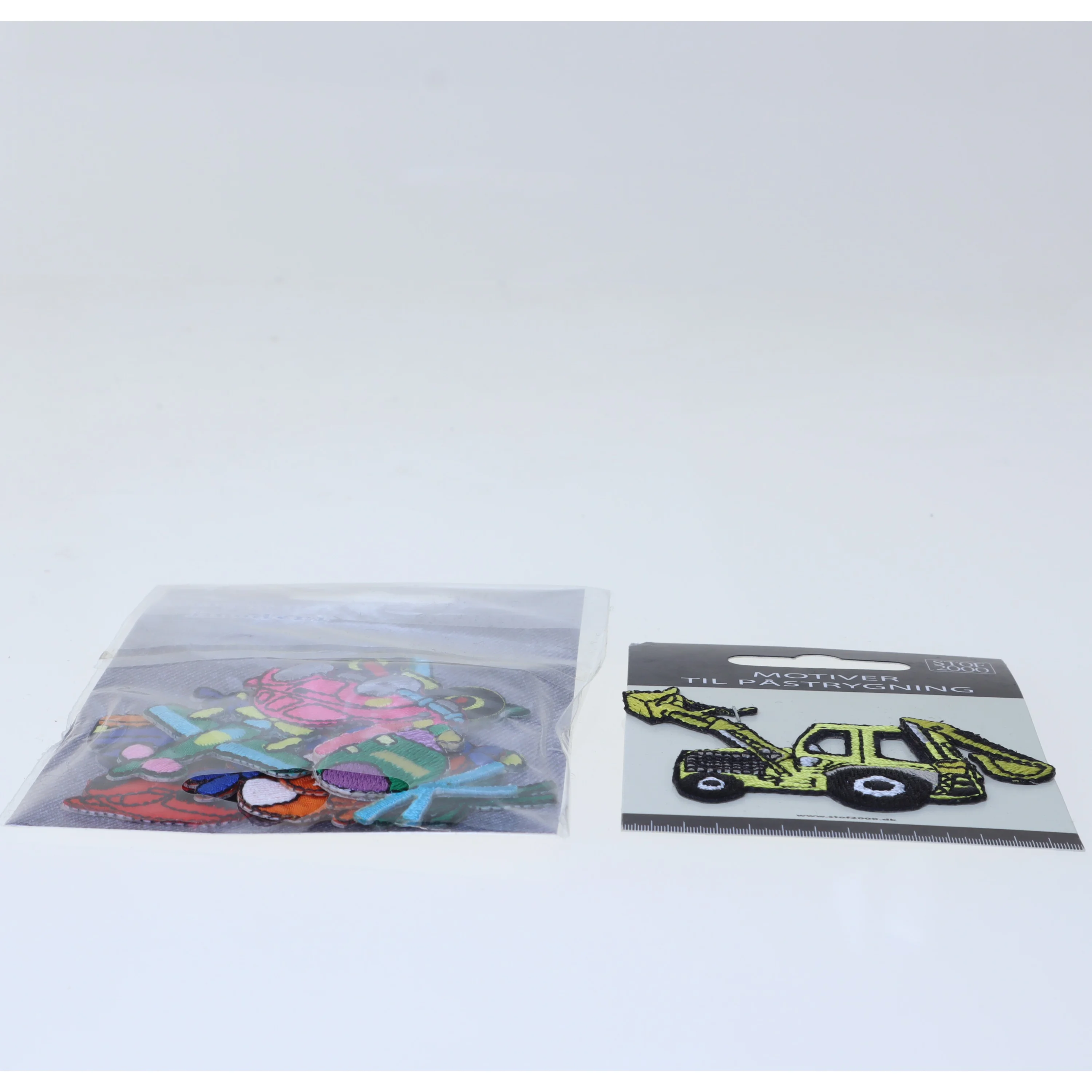 Strygemærker i designs med biler, fly mv. (str. ca 2-5 cm)