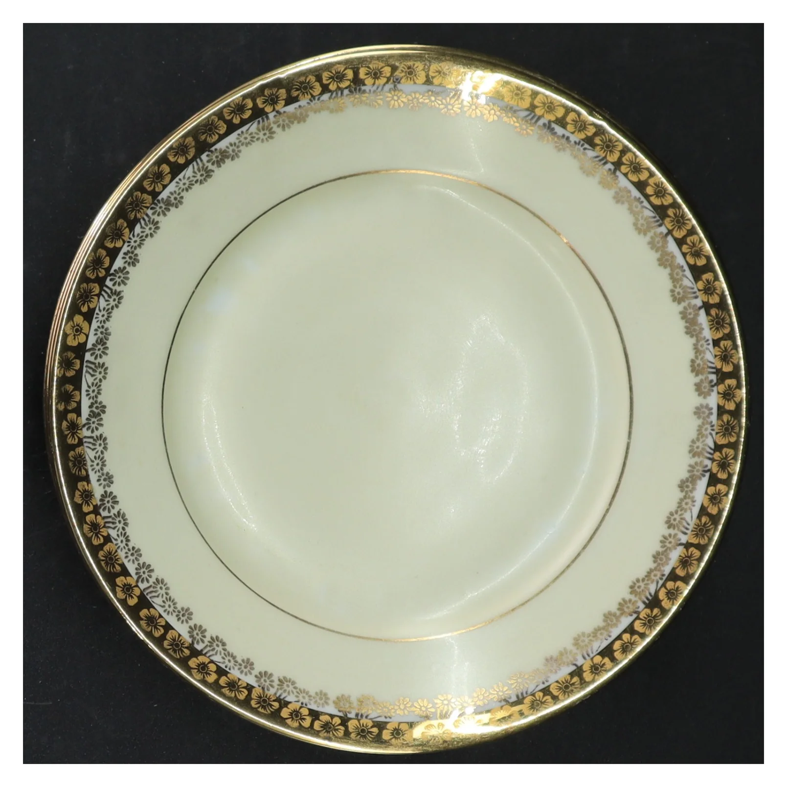 Porcelænstallerkener med guldkant