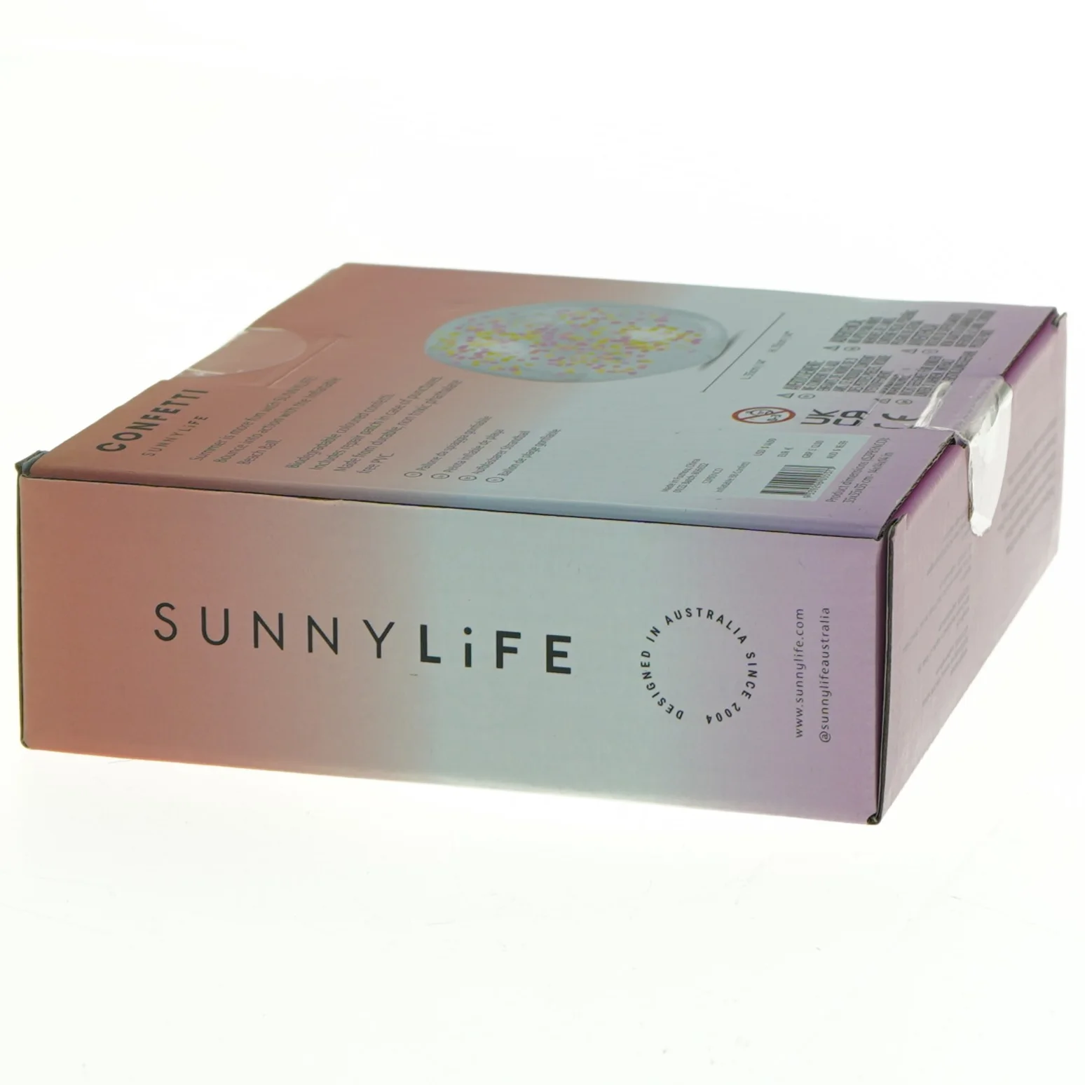 Oppustelig strandbold med konfetti fra Sunnylife (str. Kasse 15,5 x, 14,5 x, 5 cm)