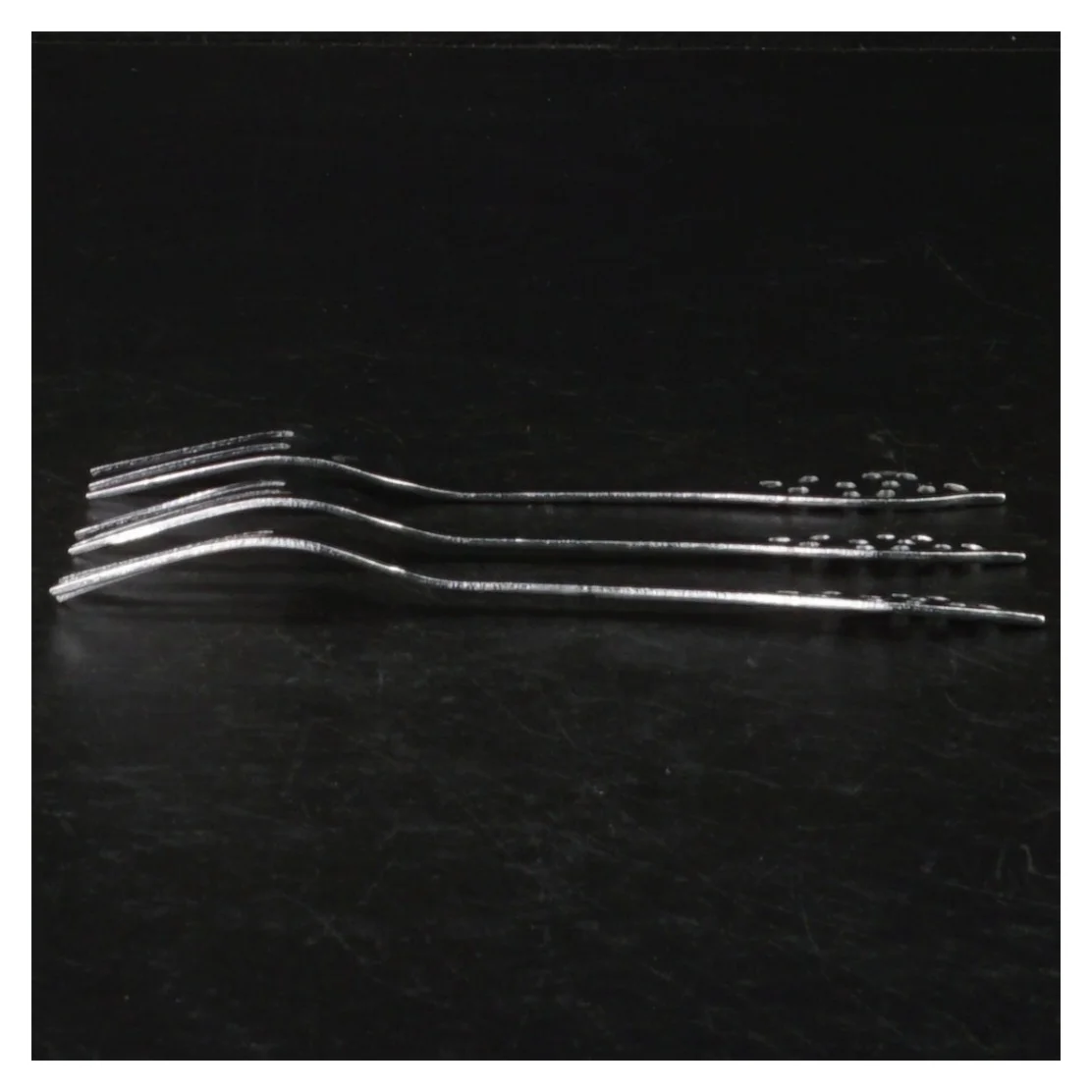 Sæt af sølvfarvede gafler (str. Længde. 13 cm)