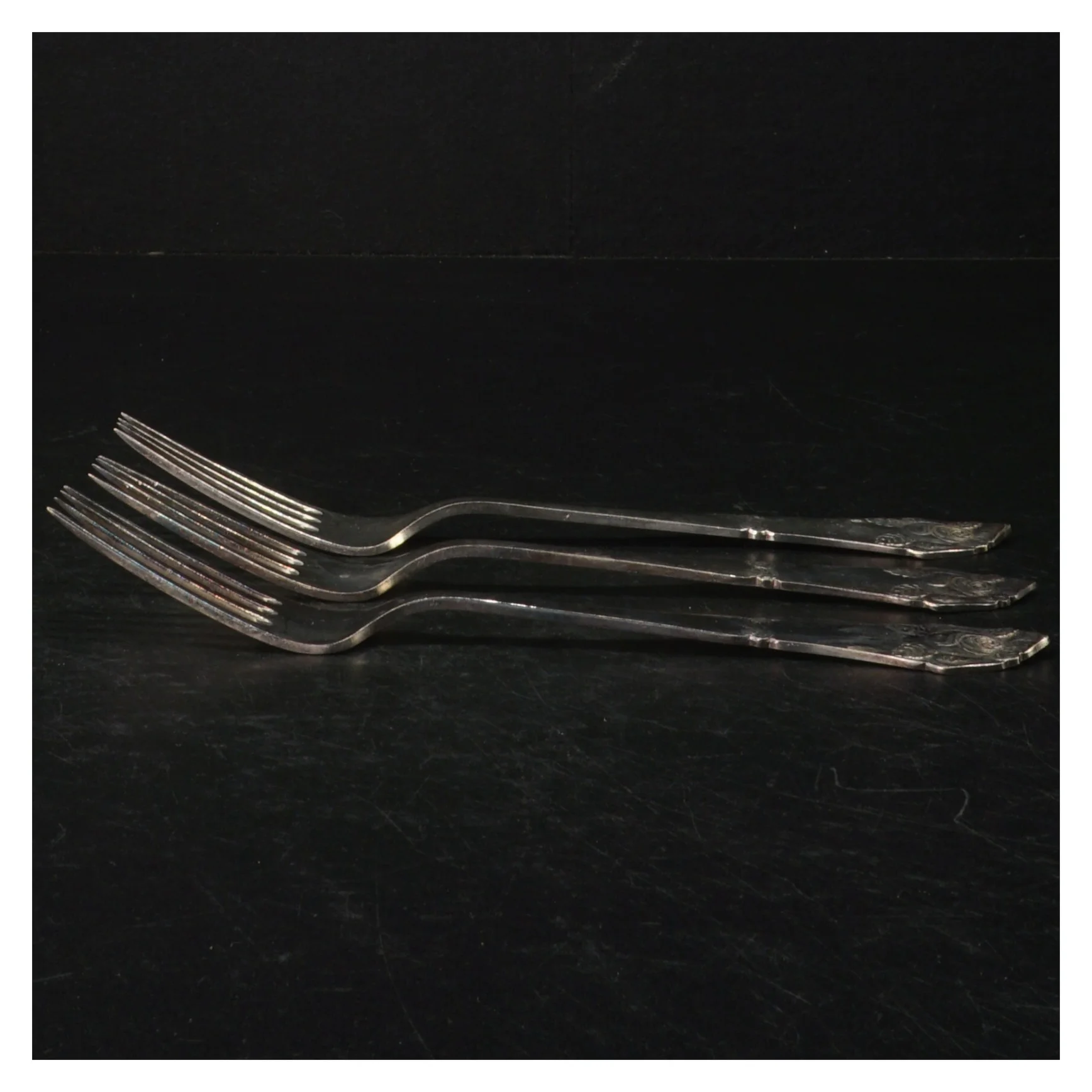 Sæt af sølvfarvede gafler (str. Længde. 20 cm)