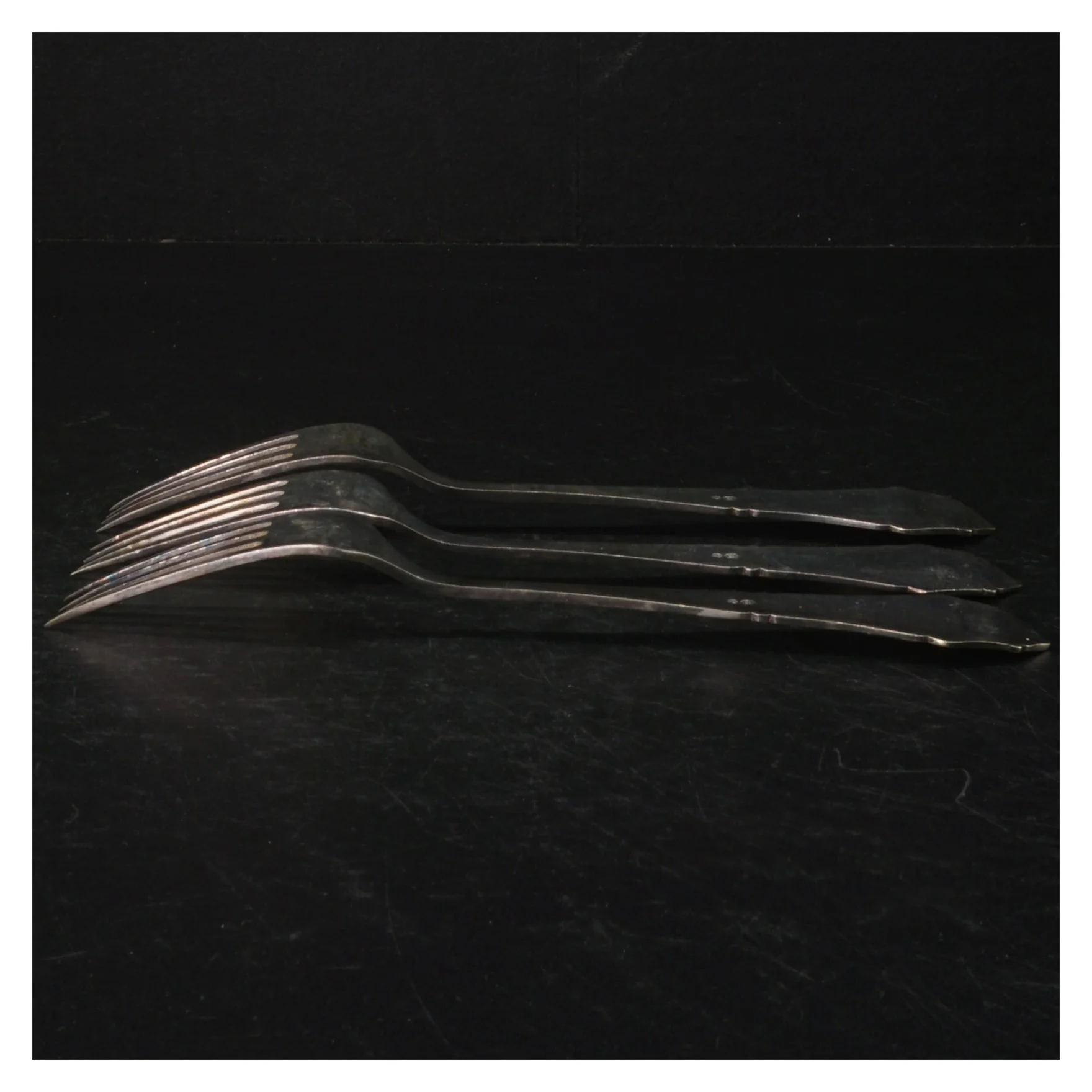 Sæt af sølvfarvede gafler (str. Længde. 20 cm)