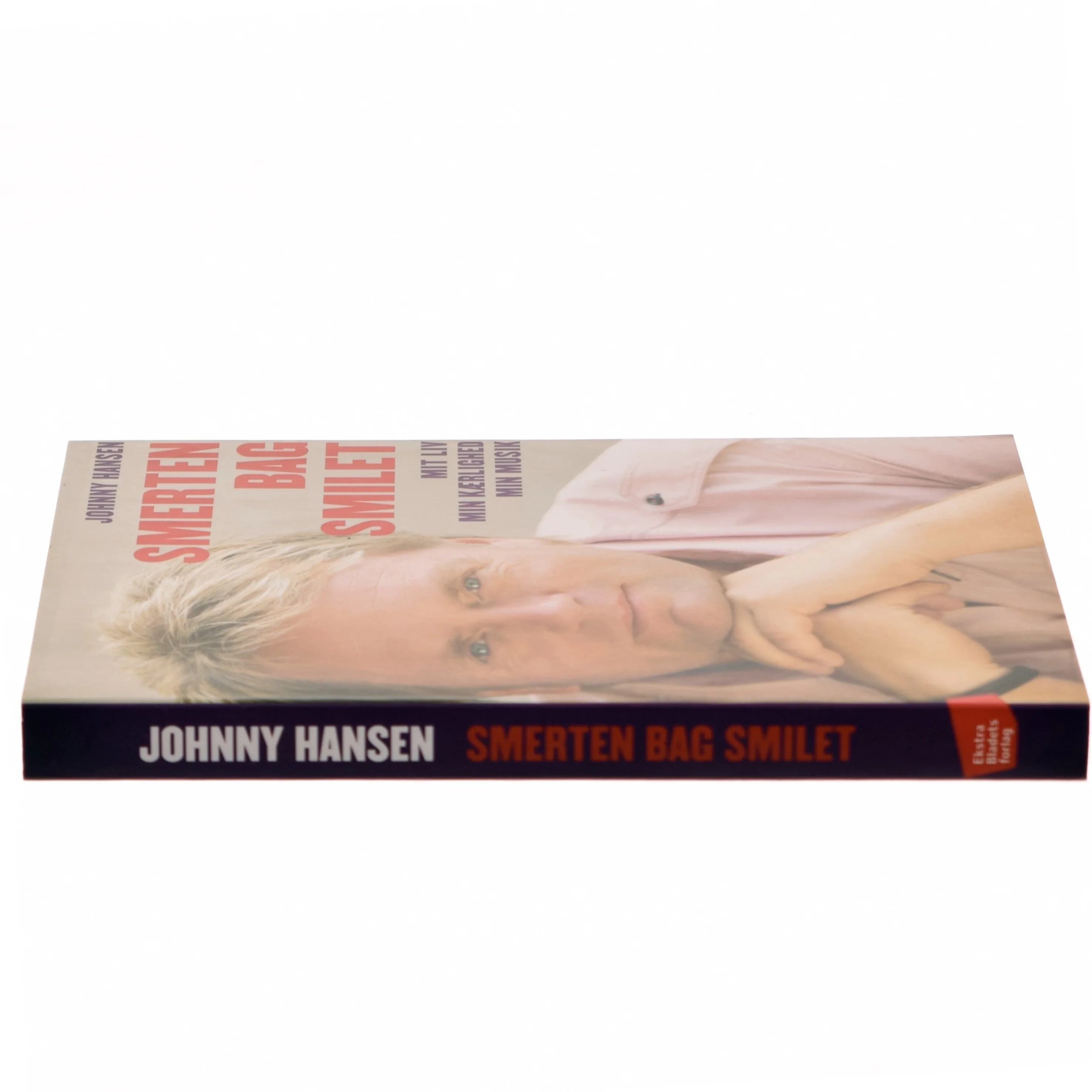 Smerten bag smilet : mit liv, min kærlighed, min musik af Johnny Hansen (f. 1965) (Bog)