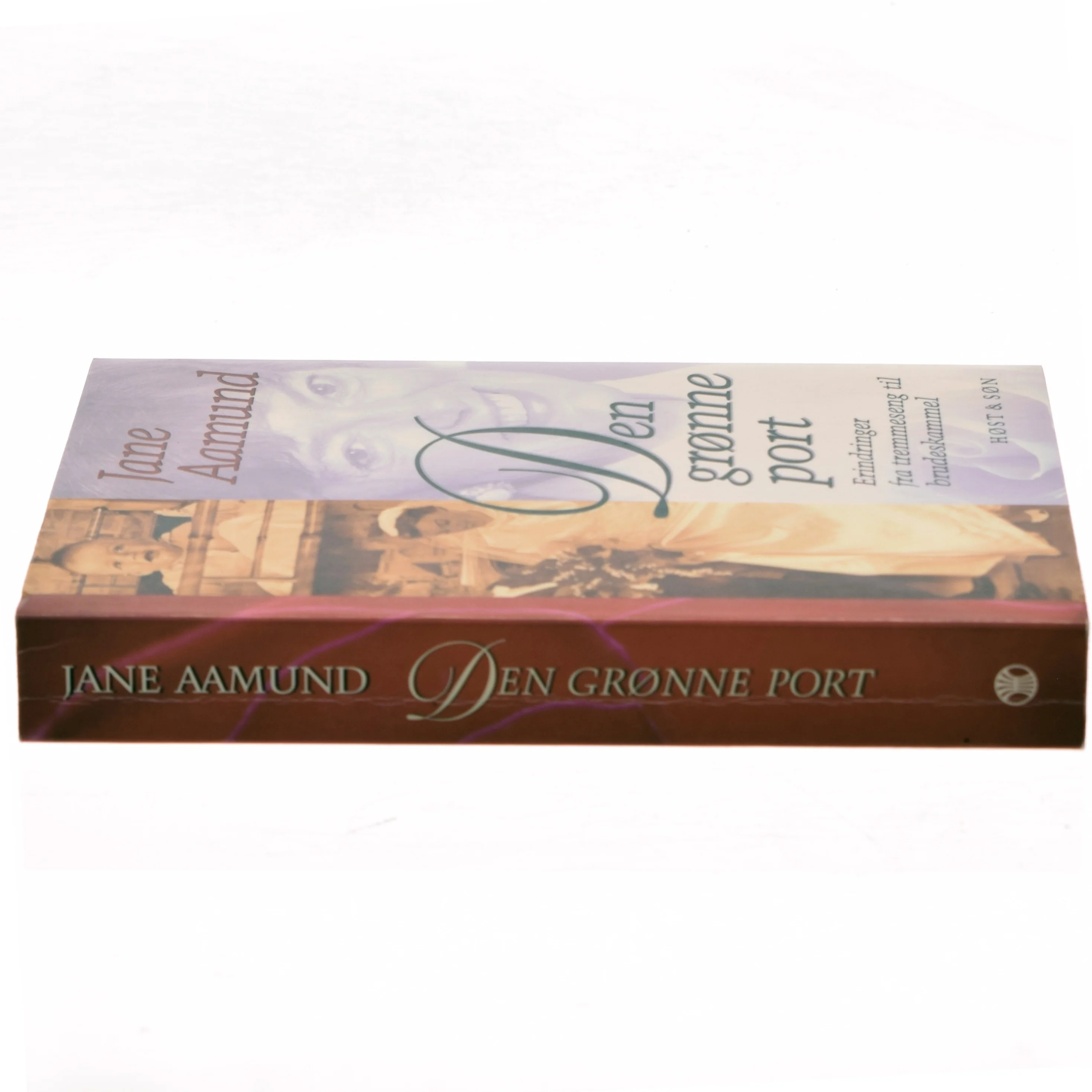 Den grønne port : erindringer fra tremmeseng til brudeskammel af Jane Aamund (Bog)
