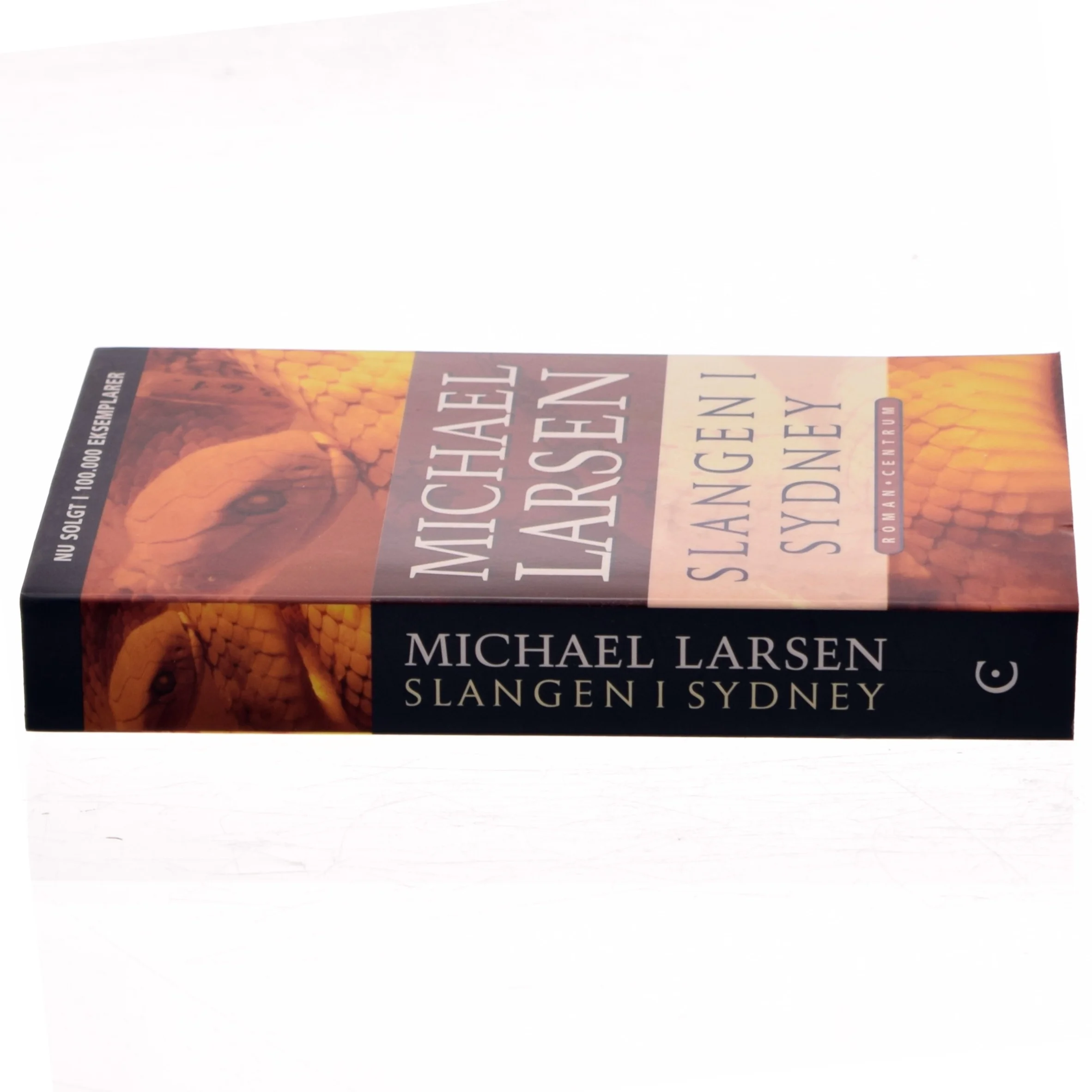 Slangen i Sydney : roman af Michael Larsen (f. 1961) (Bog)