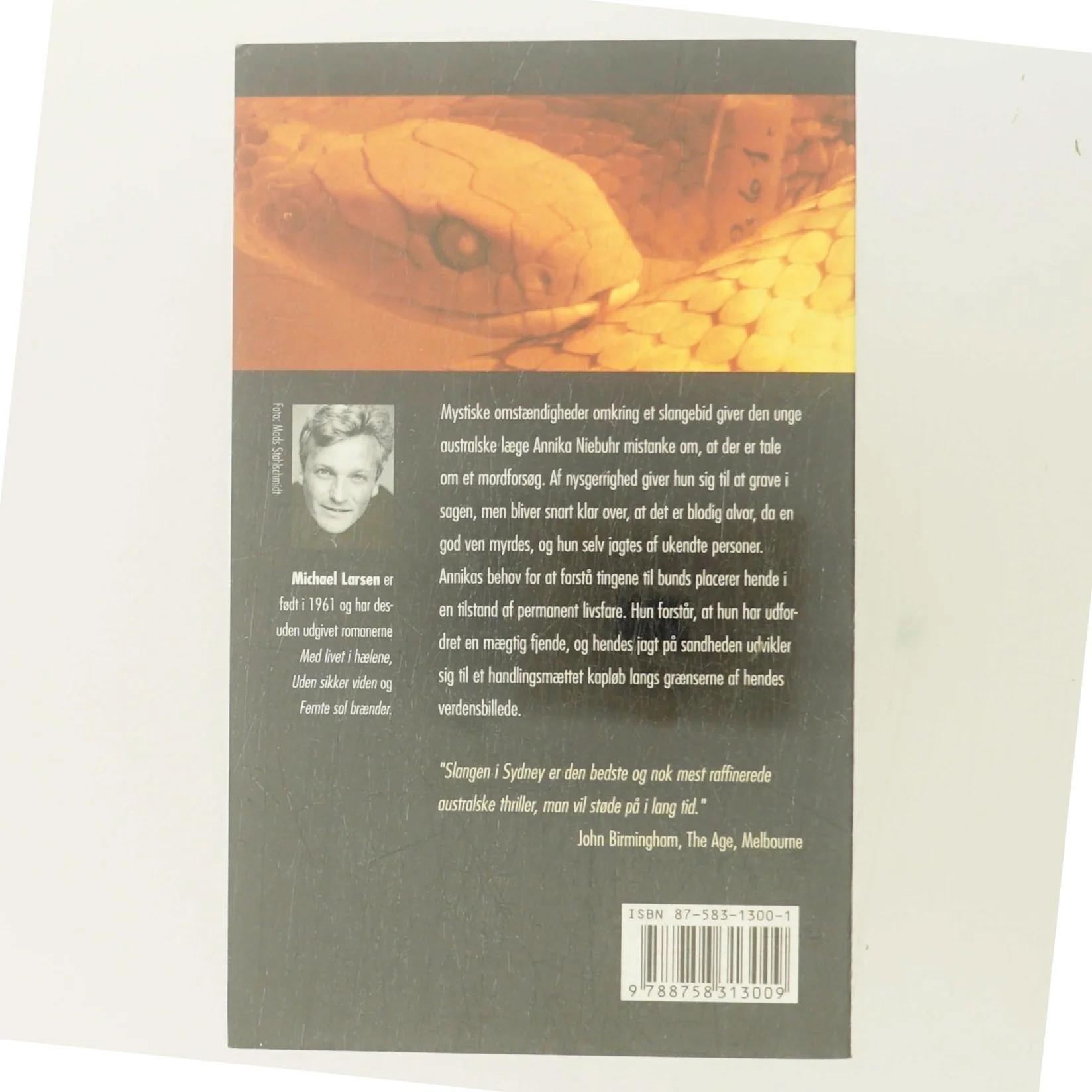 Slangen i Sydney : roman af Michael Larsen (f. 1961) (Bog)