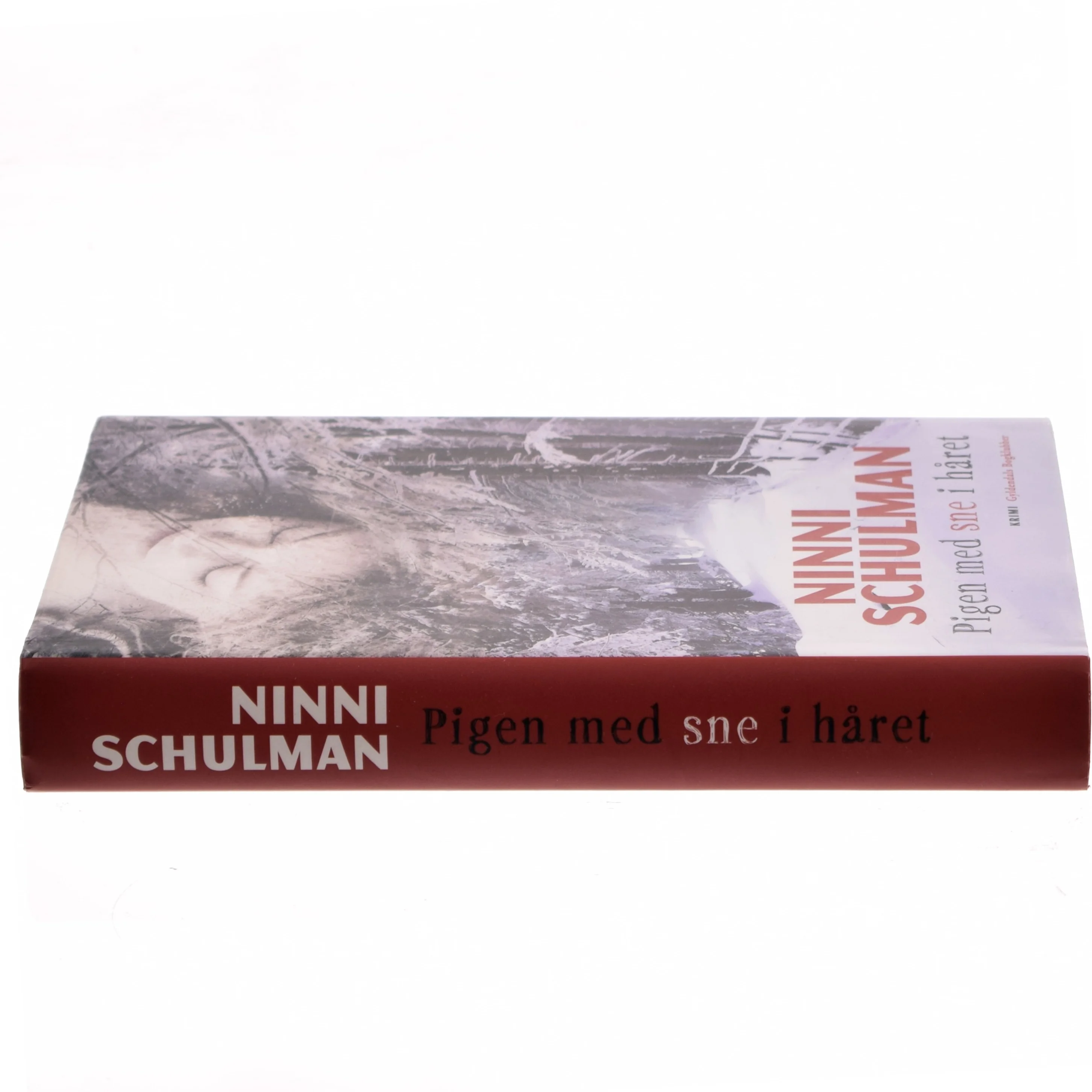 Pigen med sne i håret : kriminalroman af Ninni Schulman (Bog)
