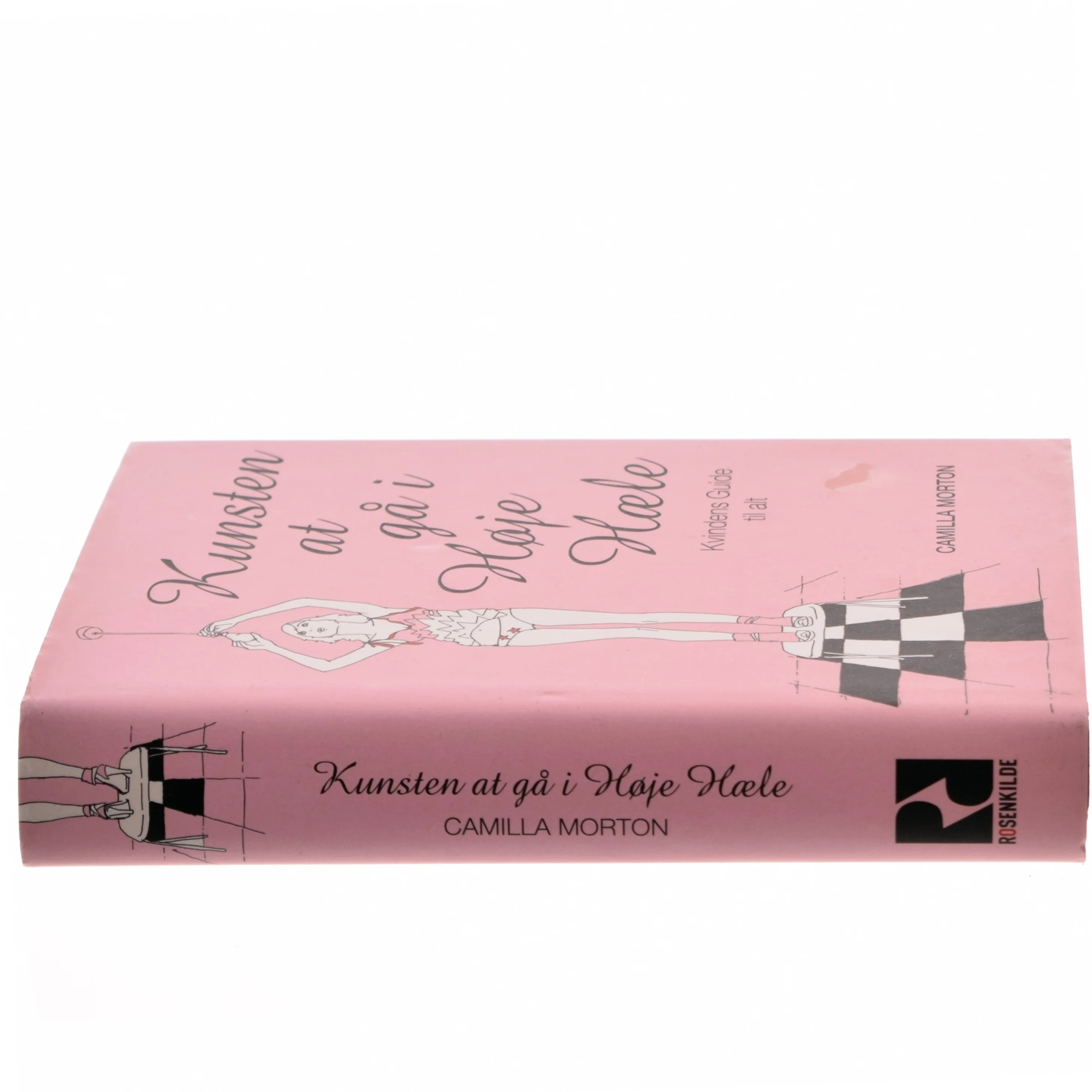 Kunsten at gå i høje hæle : kvindens guide til alt af Camilla Morton (Bog)