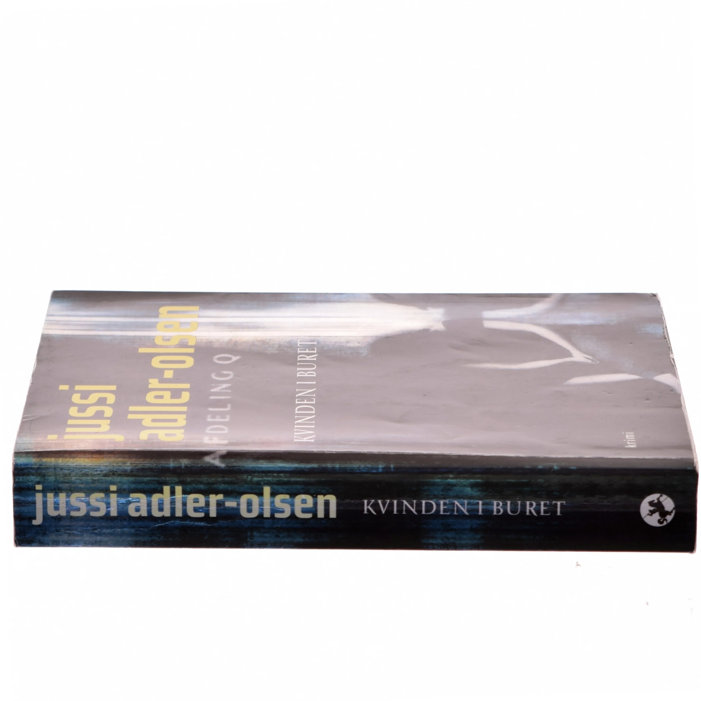 Kvinden i buret : krimi af Jussi Adler-Olsen (Bog)