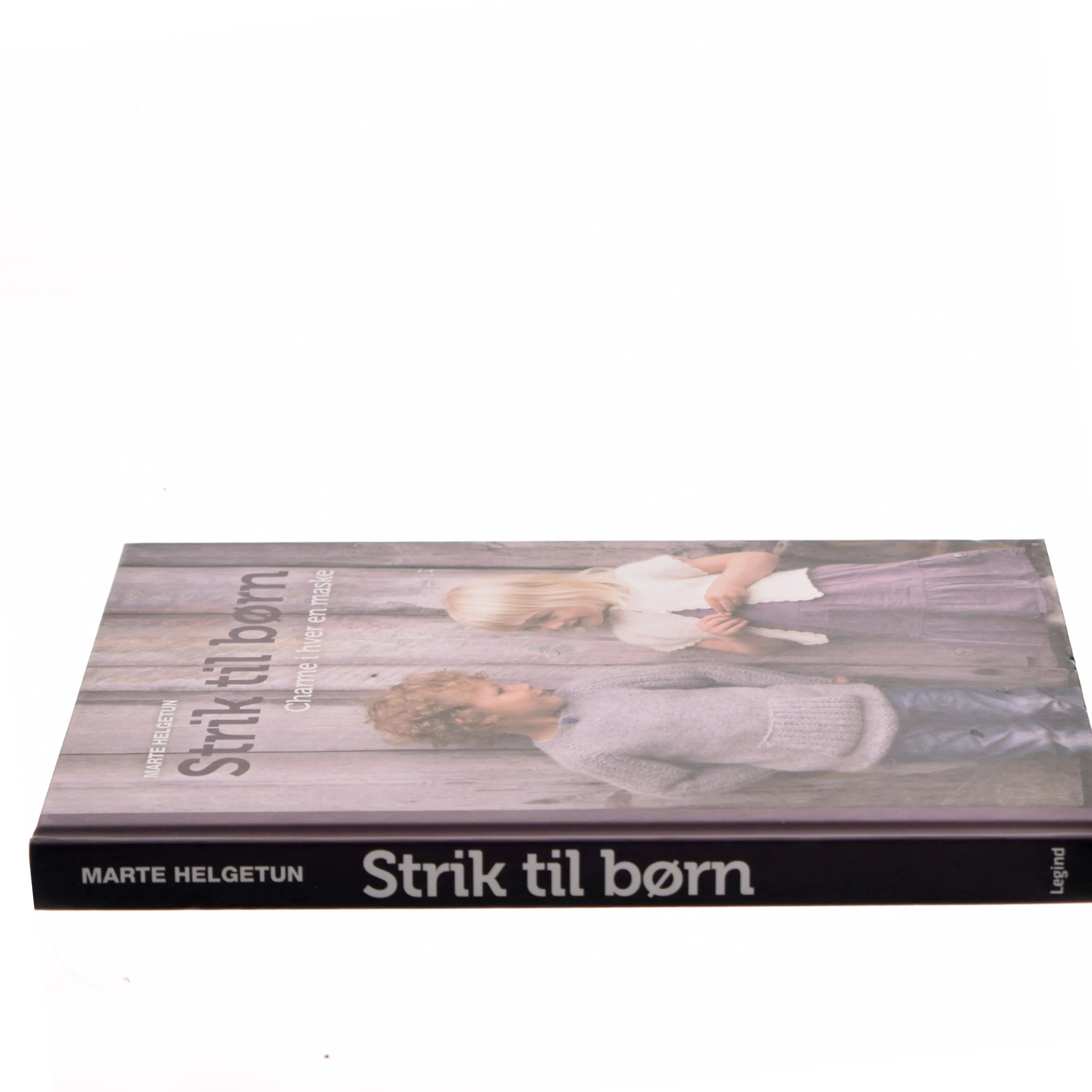 Strik til børn : charme i hver en maske af Marte Helgetun (Bog)