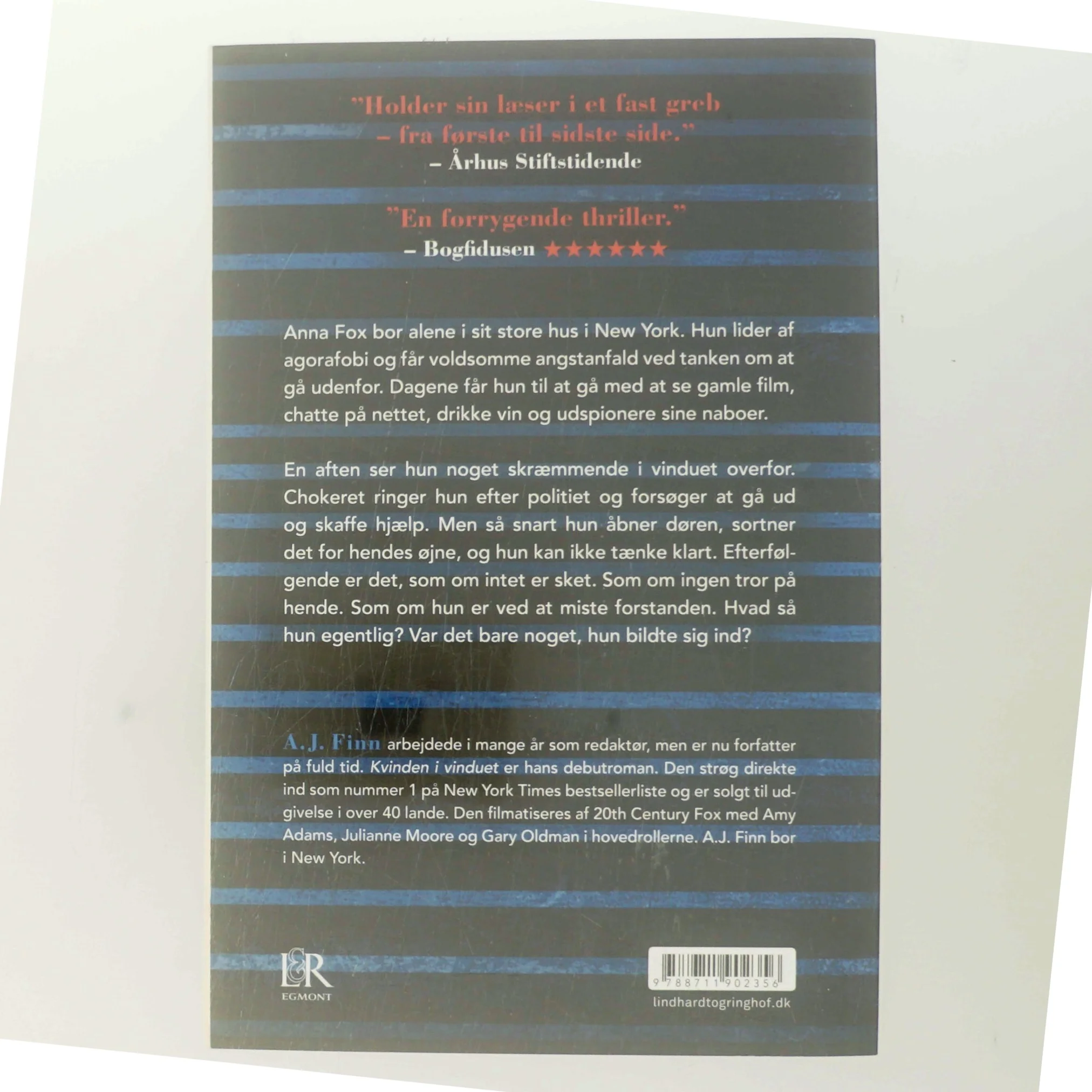 Kvinden i vinduet af A. J. Finn (Bog)