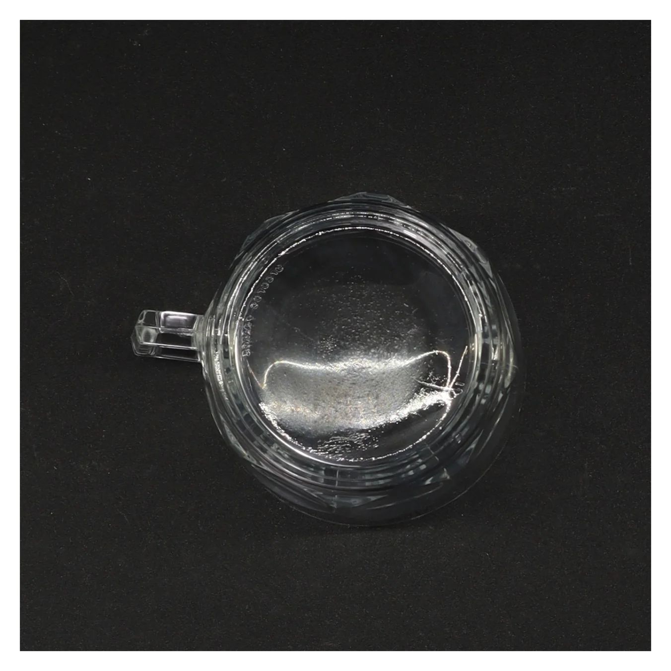 Gennemsigtig glaskrus (str. 7 x ø 8 cm)