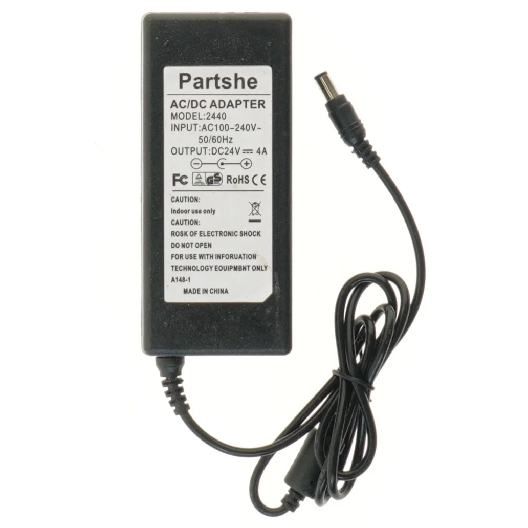 AC/DC adapter fra Partshe (str. 13,5x6 cm)