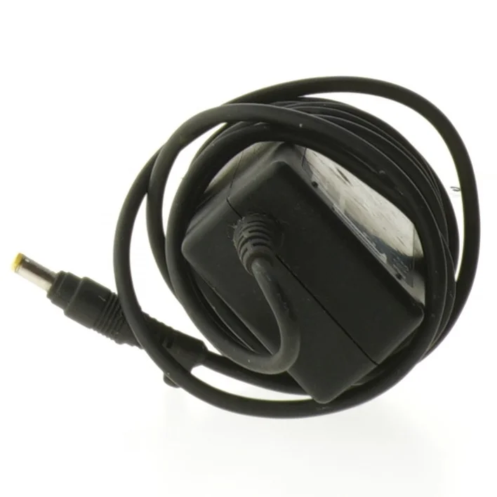 Strømforsyning til bærbar computer fra HP (str. 10,5x4,5 cm)
