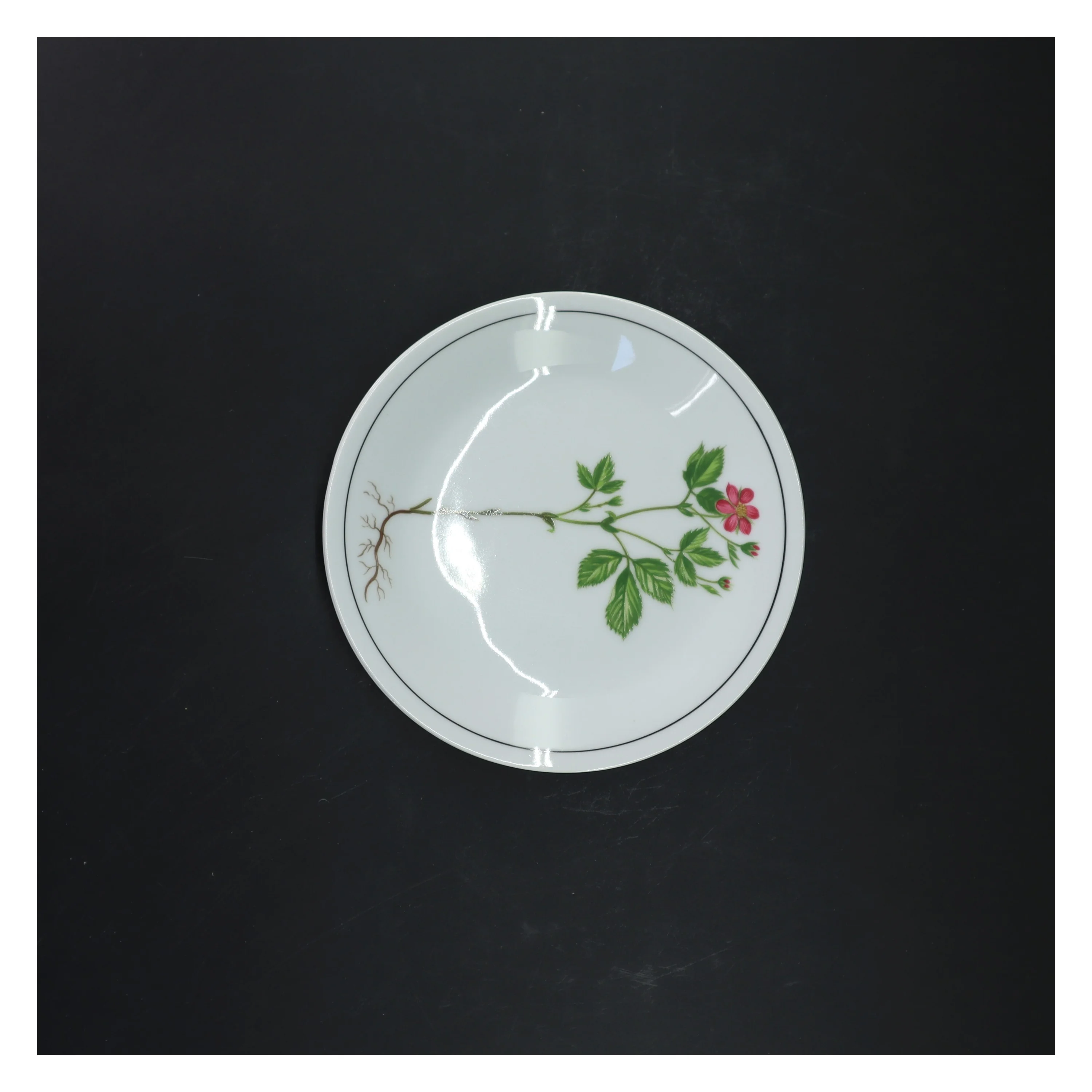 Porcelænstallerken med blomsterprint fra Tirschenreuth (str. Ø 17 cm)