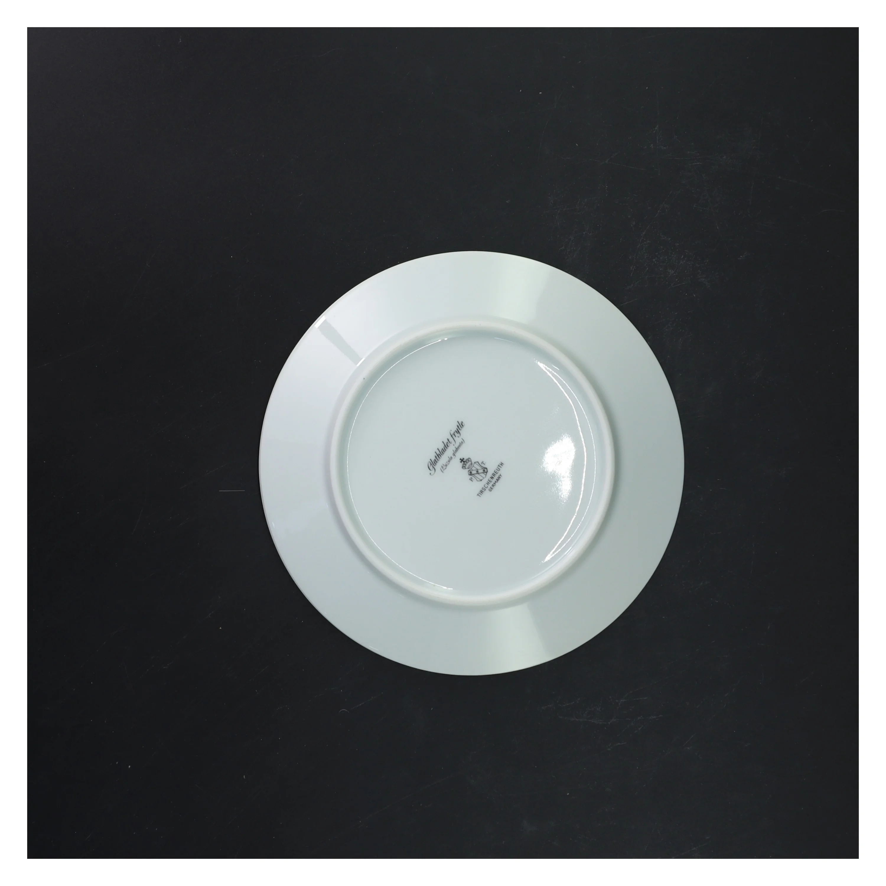 Porcelænstallerkener med blomstermotiv fra Royal Tettau (str. Ø 17 cm)