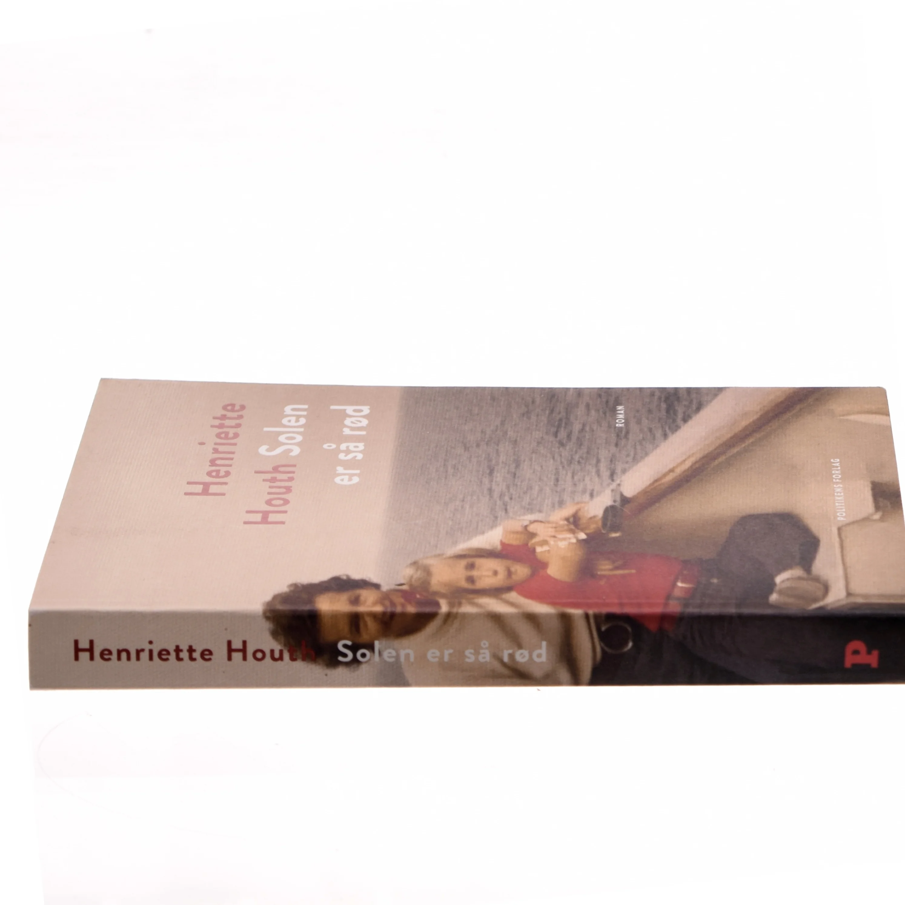 Solen er så rød : roman af Henriette Houth (Bog)