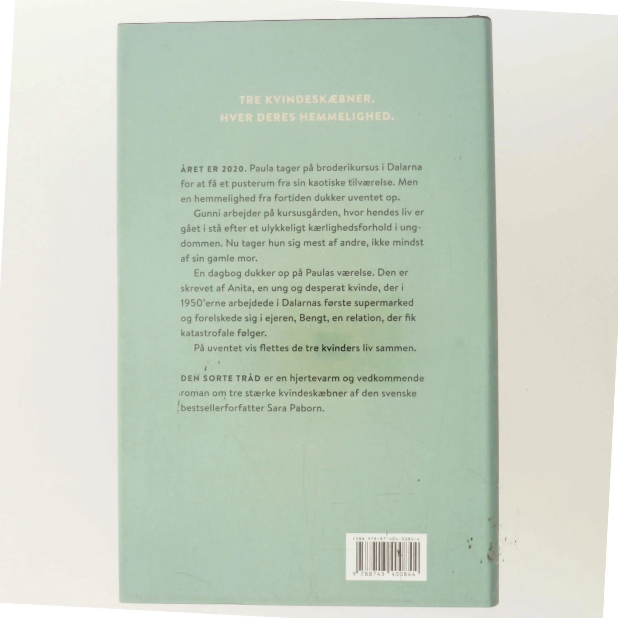 Den sorte tråd : roman af Sara Paborn (f. 1972) (Bog)