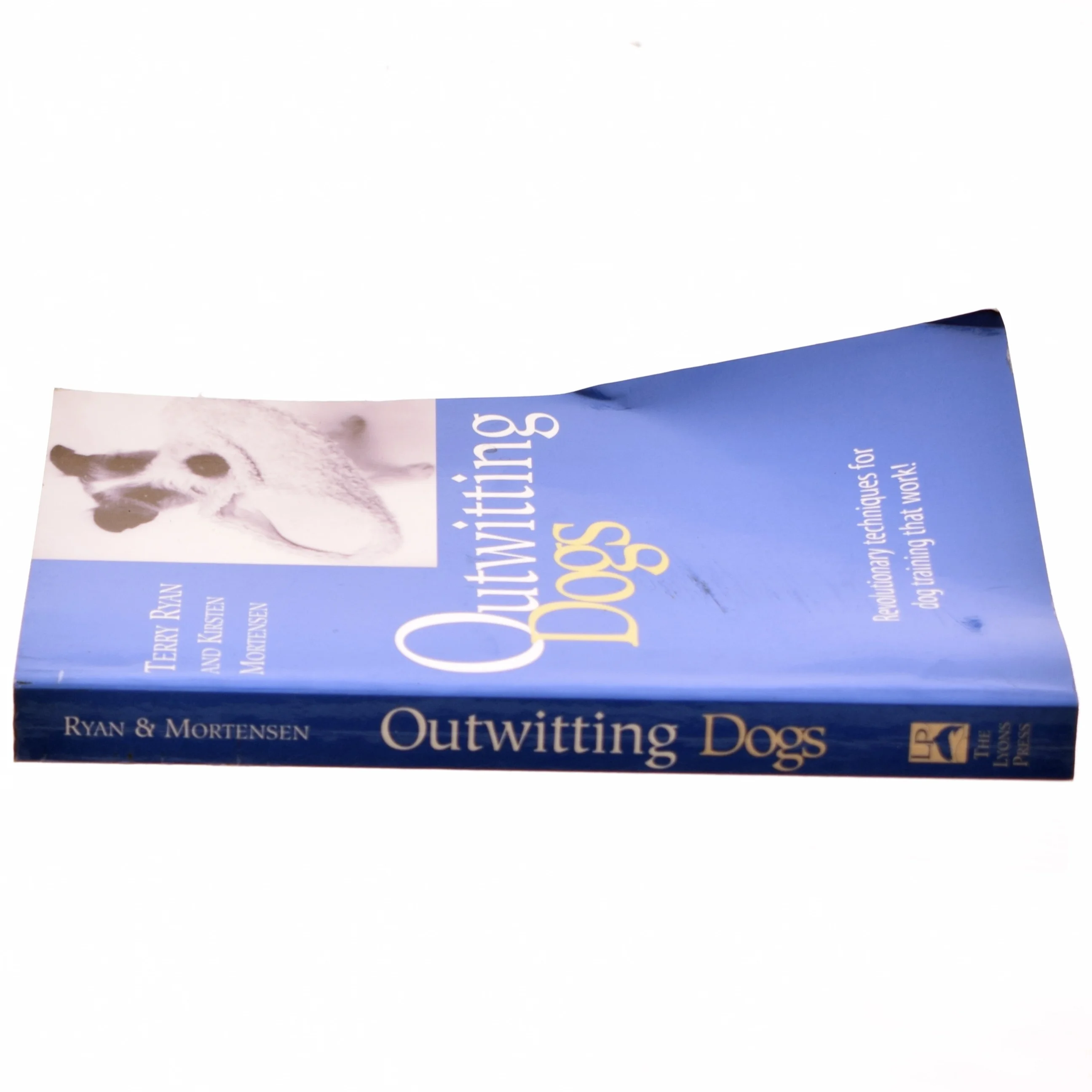 Outwitting dogs af Terry Ryan
