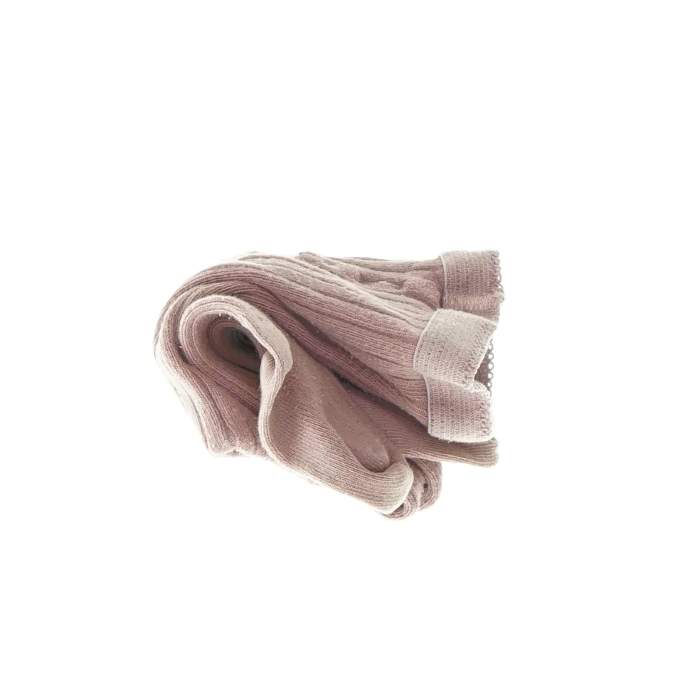 Lyserøde strømpebukser.