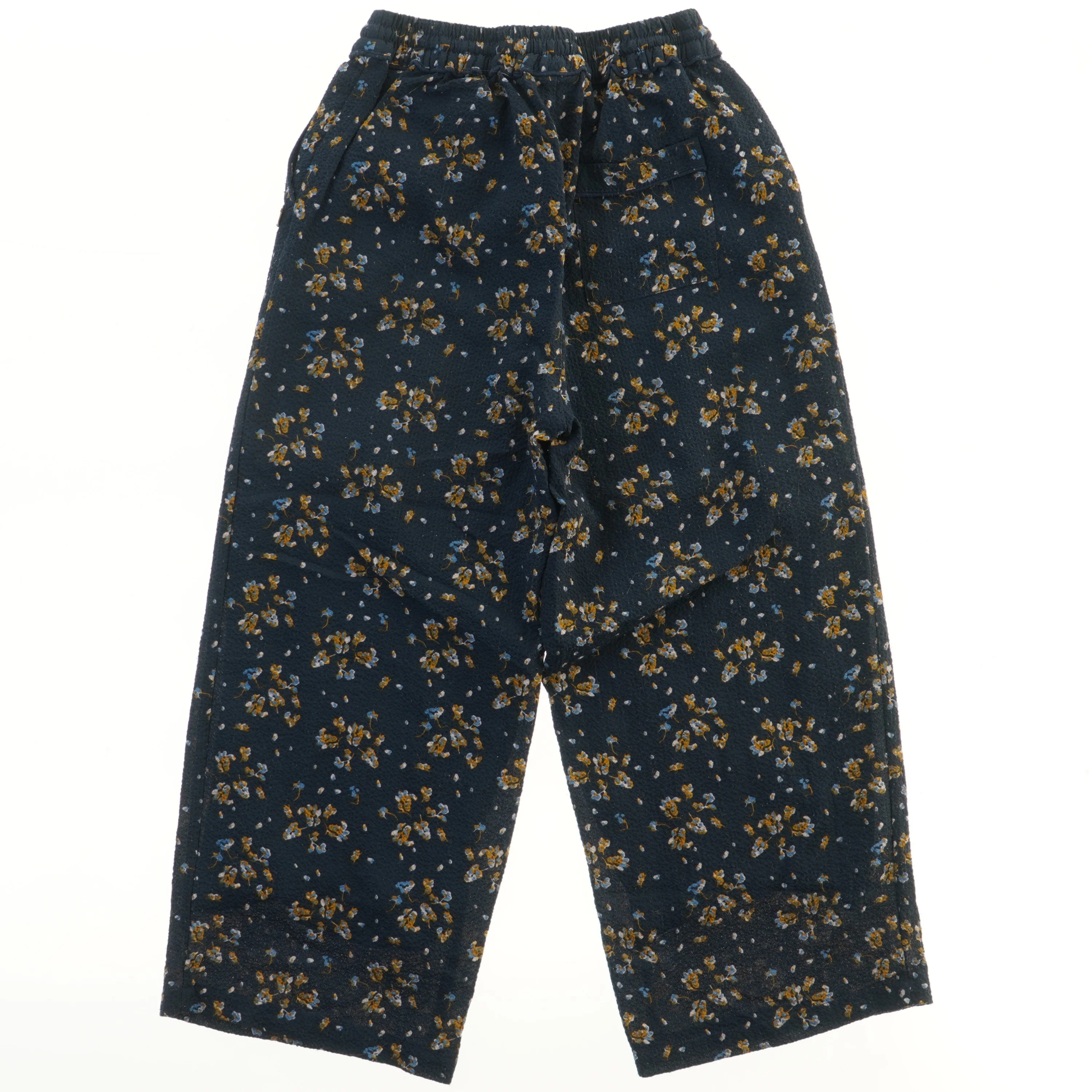 Bukser med blomsterprint fra Pomp de Lux (str. 128)