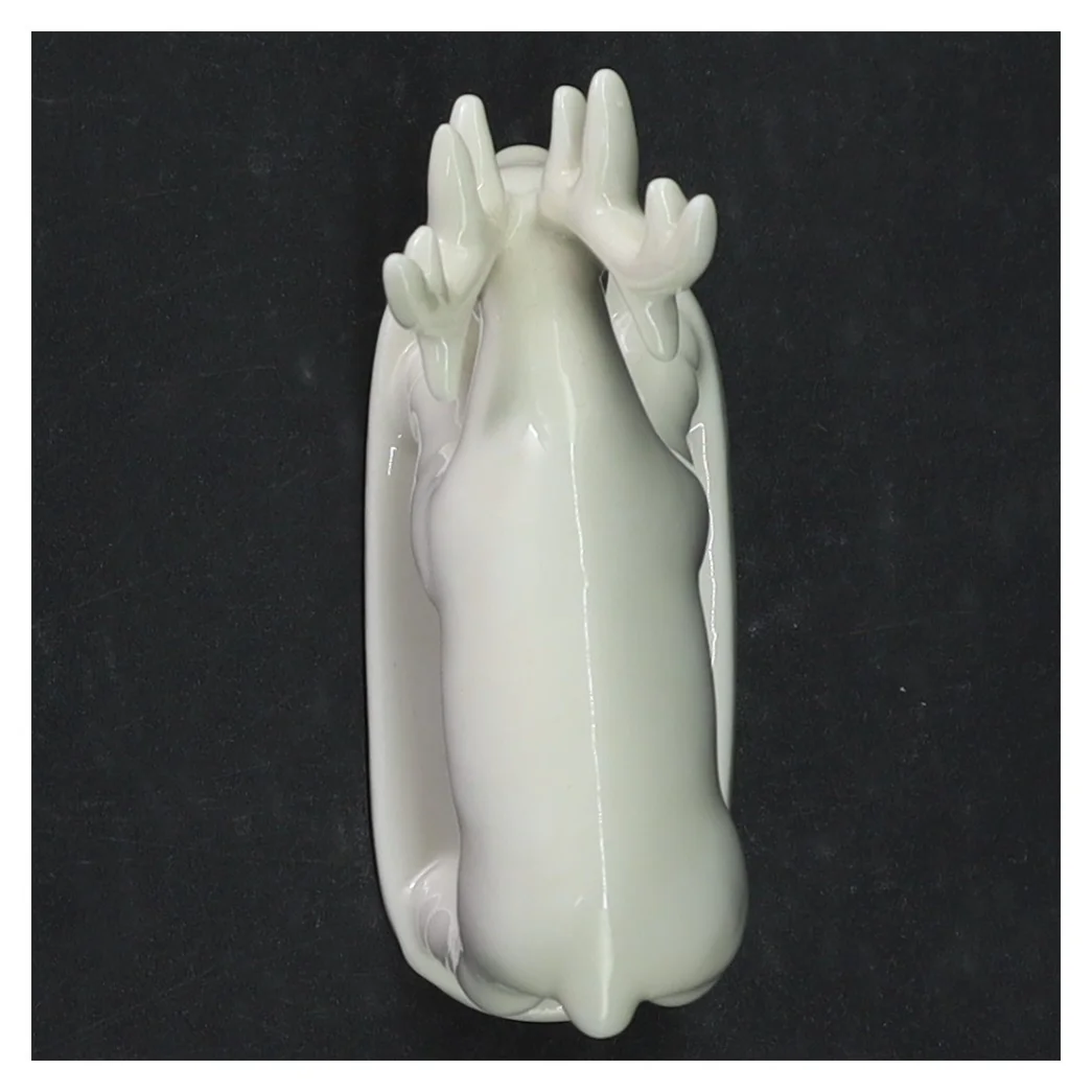 Hvid porcelæn elgfigur (str. 9,5 x. 7,5 cm)