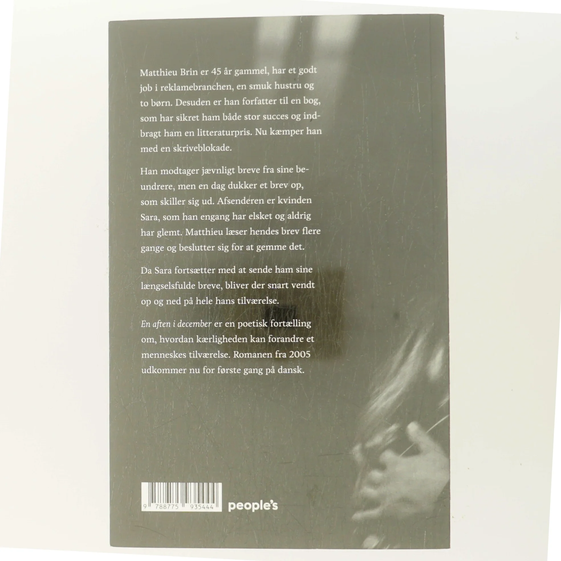 En aften i december : roman af Delphine de Vigan (Bog)