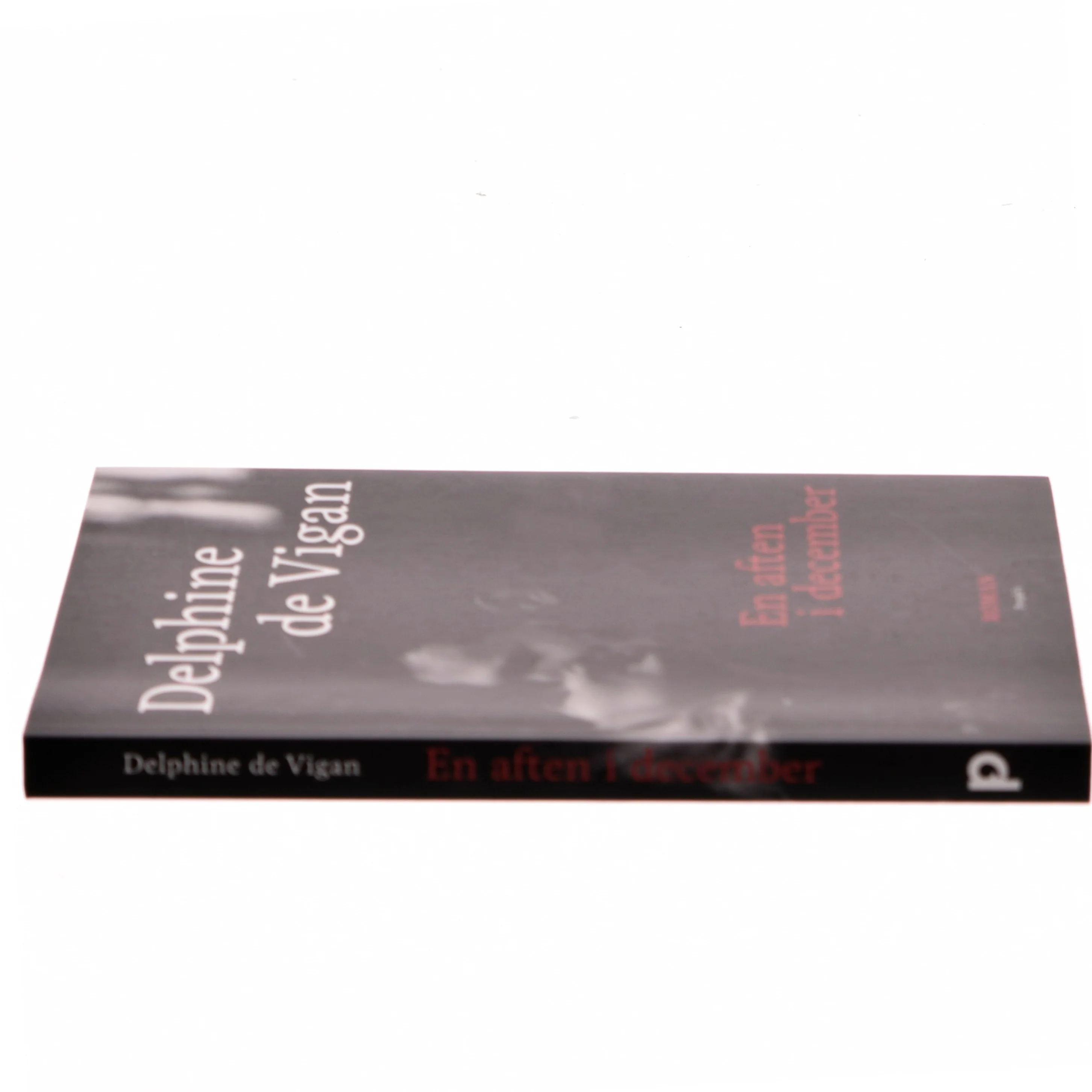 En aften i december : roman af Delphine de Vigan (Bog)