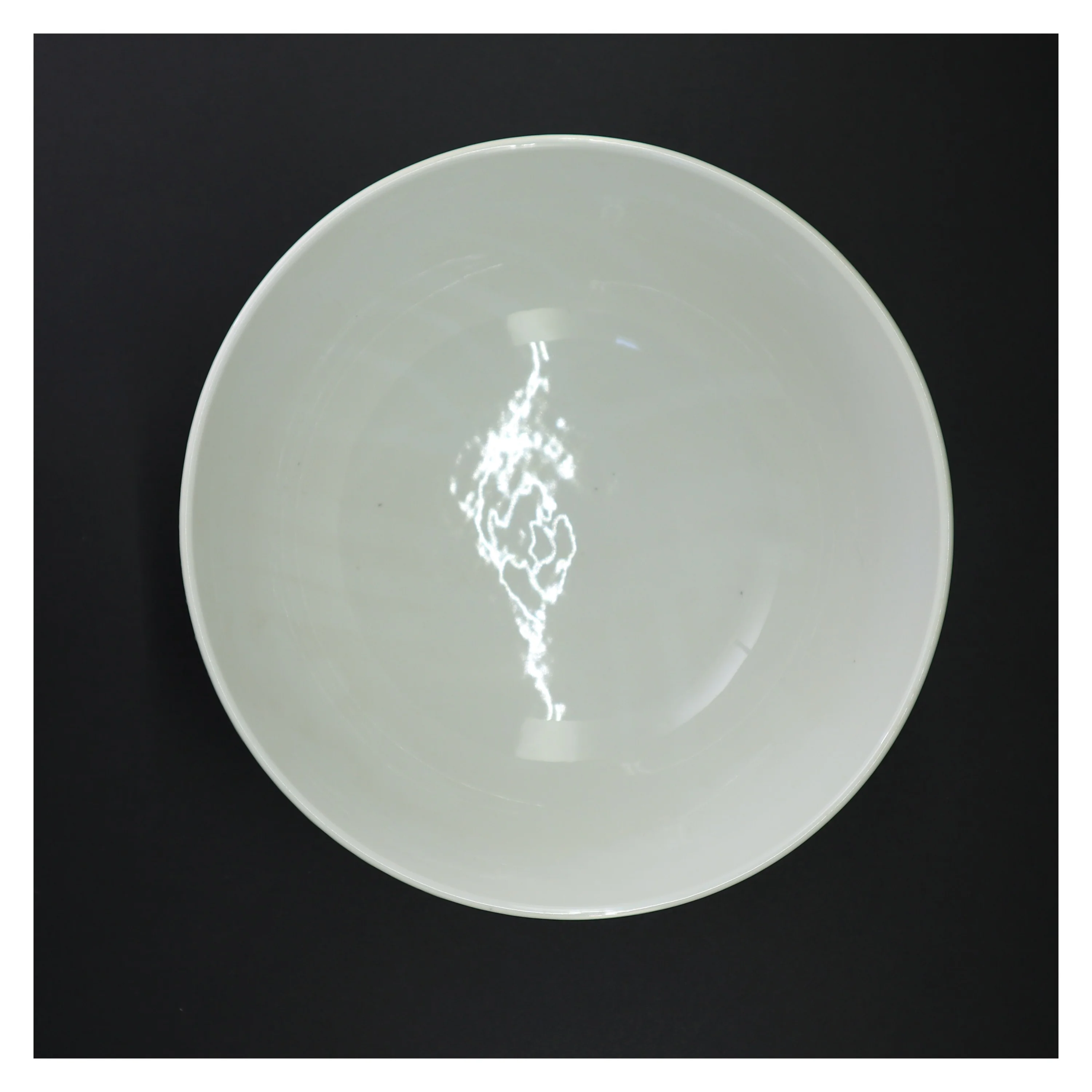 Hvid porcelænsskål (str. 23 x 12 cm)