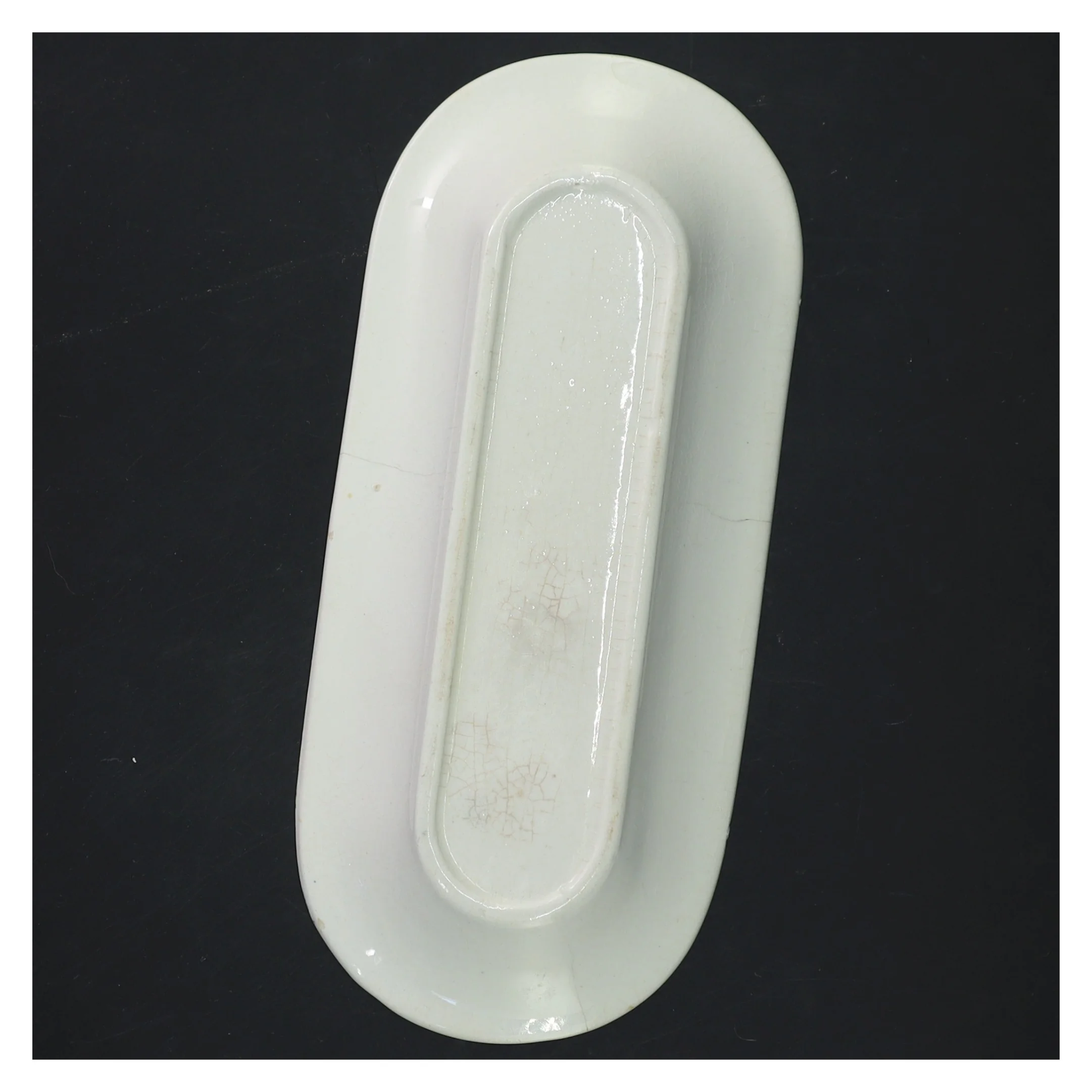 Aflangt porcelænsfad med blå dekor (str. 22x10x2 cm)