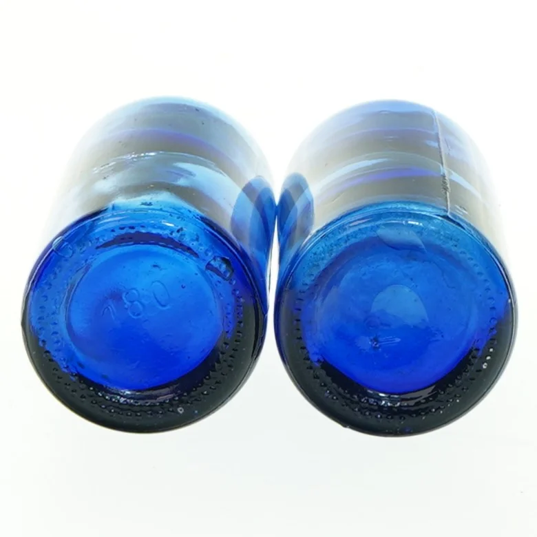 Blå glasflasker (str. 14x5,5 cm)